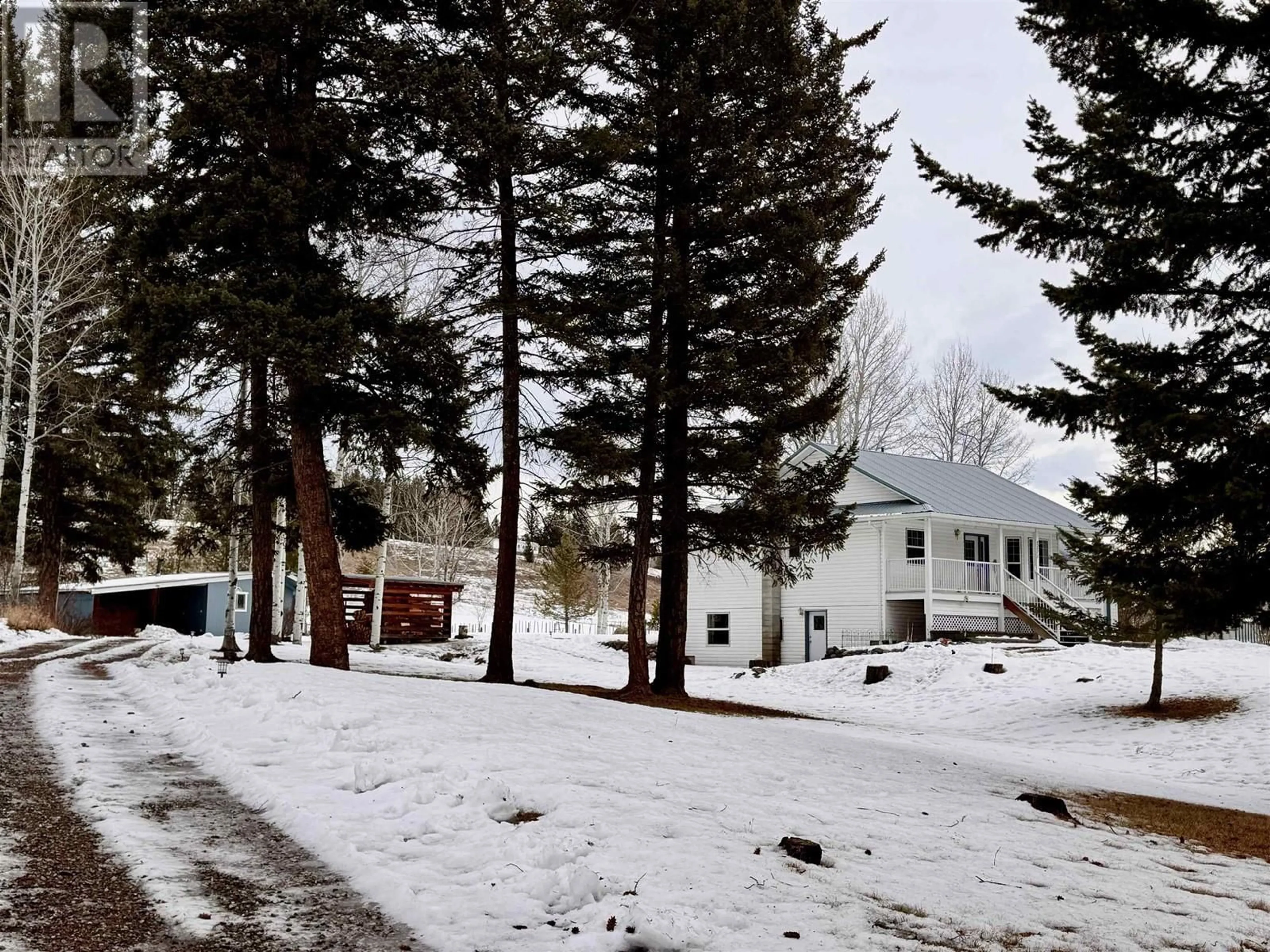 Home with vinyl exterior material, street for 5571 LAKESIDE COURT, 100 Mile House British Columbia V0K2E1
