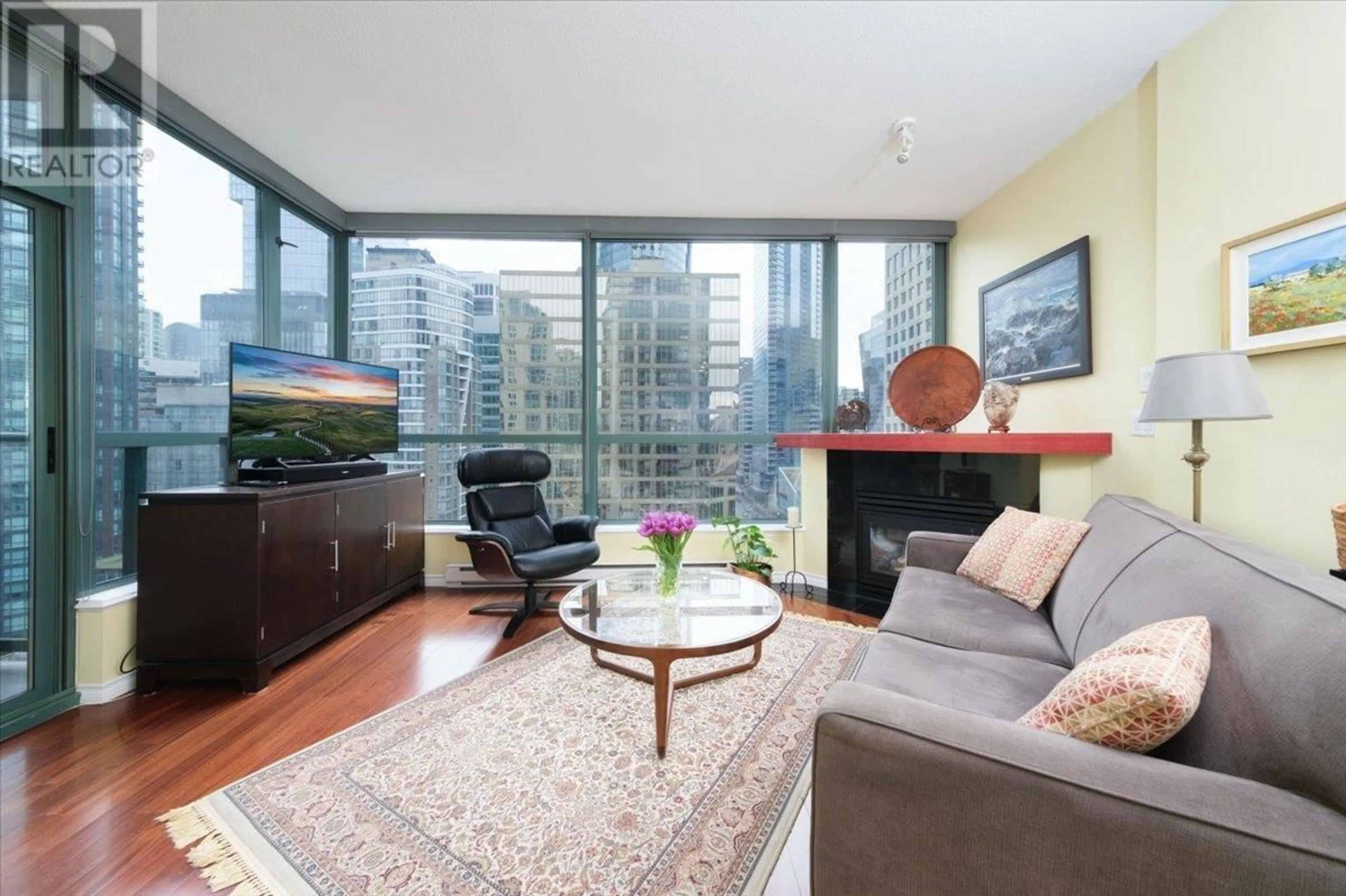 Living room with furniture, wood/laminate floor for 1501 1239 W GEORGIA STREET, Vancouver British Columbia V6E4R8