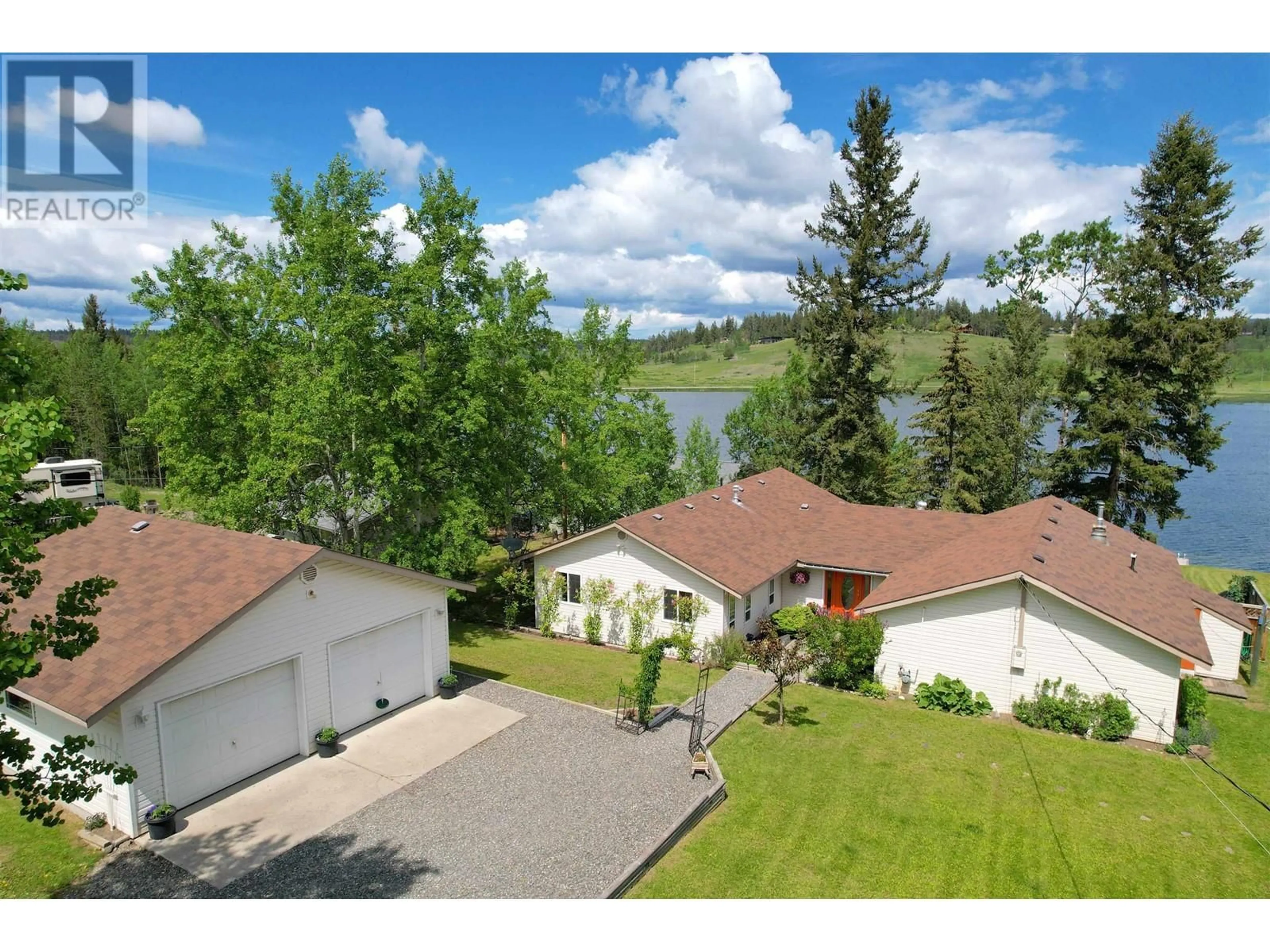 A pic from outside/outdoor area/front of a property/back of a property/a pic from drone, water/lake/river/ocean view for 5151 WATSON LAKE ROAD, 100 Mile House British Columbia V0K2E1