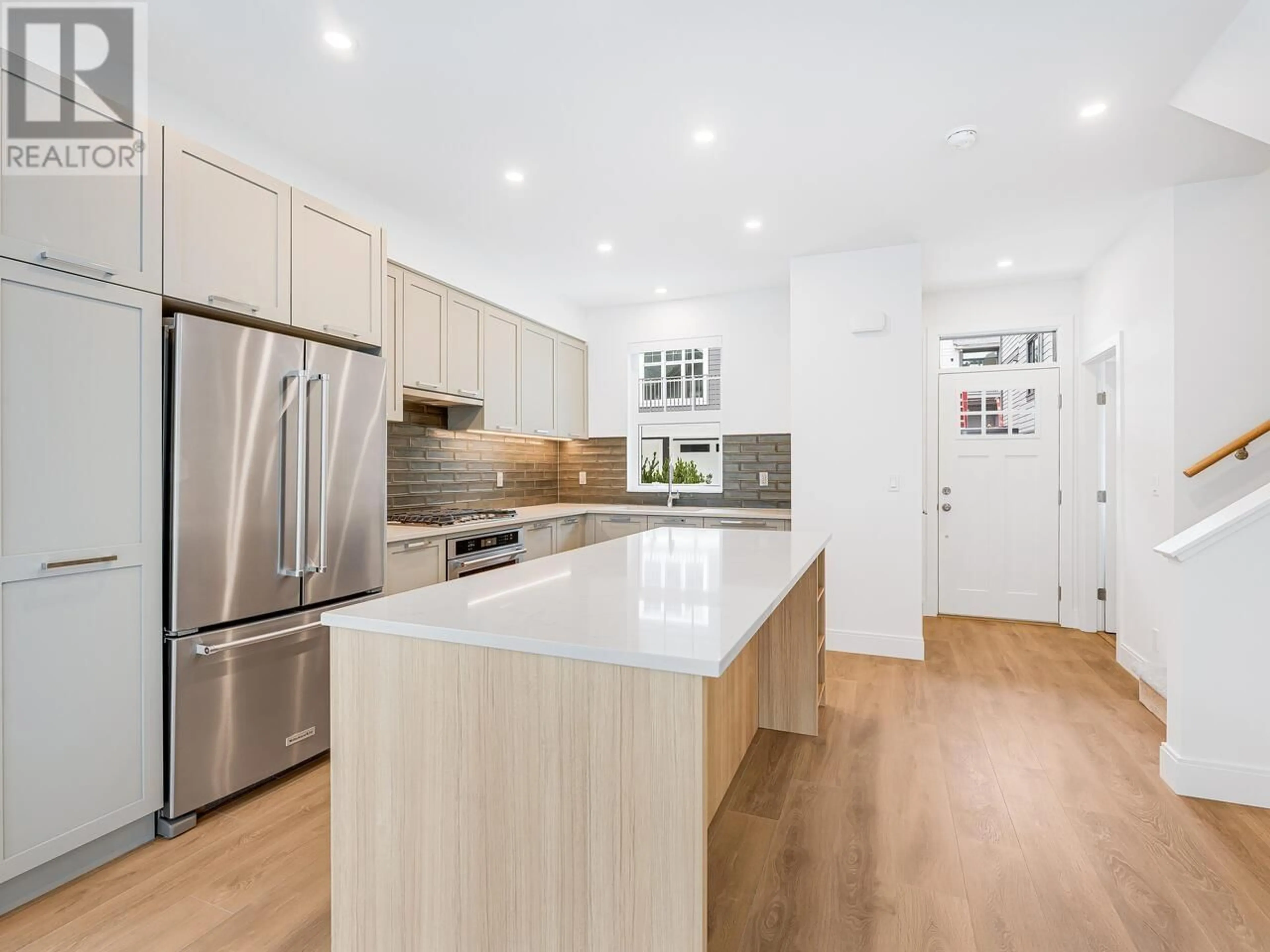 Open concept kitchen, wood/laminate floor for 201 - 1310 MITCHELL STREET, Coquitlam British Columbia V3E0T9