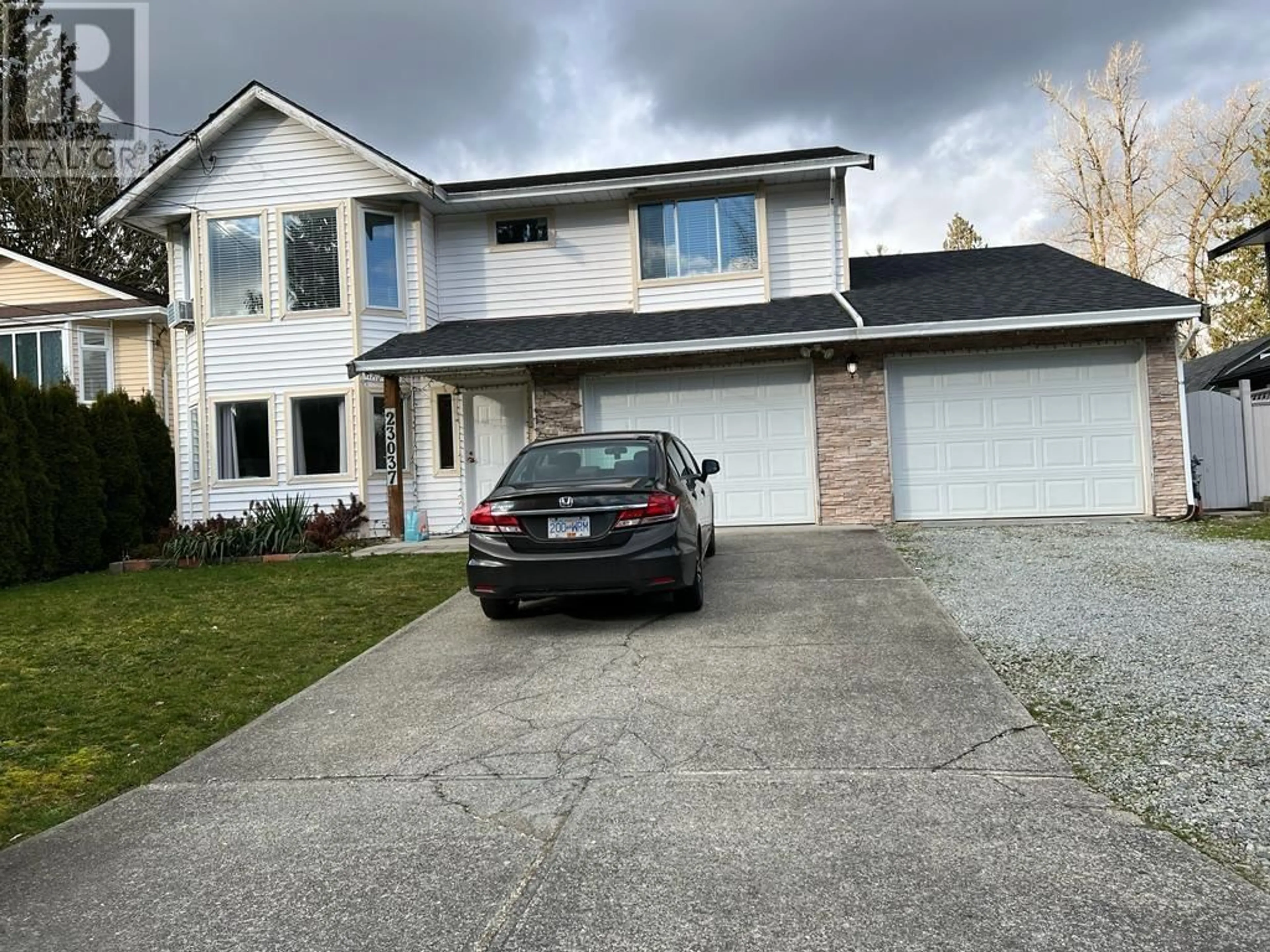 Home with vinyl exterior material, street for 23037 126 AVENUE, Maple Ridge British Columbia V2X4P4