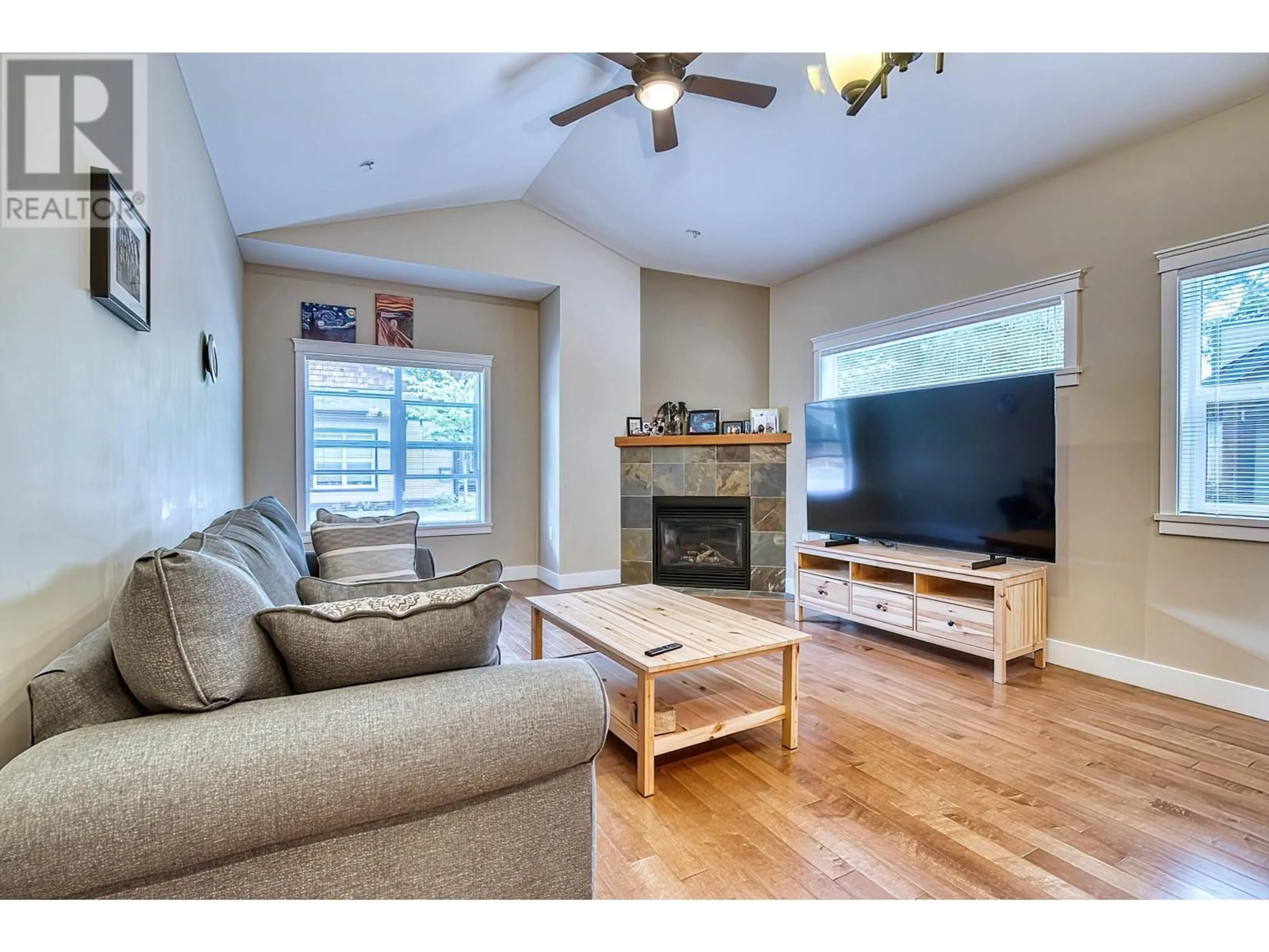 Living room with furniture, wood/laminate floor for 104 - 518 SHAW ROAD, Gibsons British Columbia V0N1V8