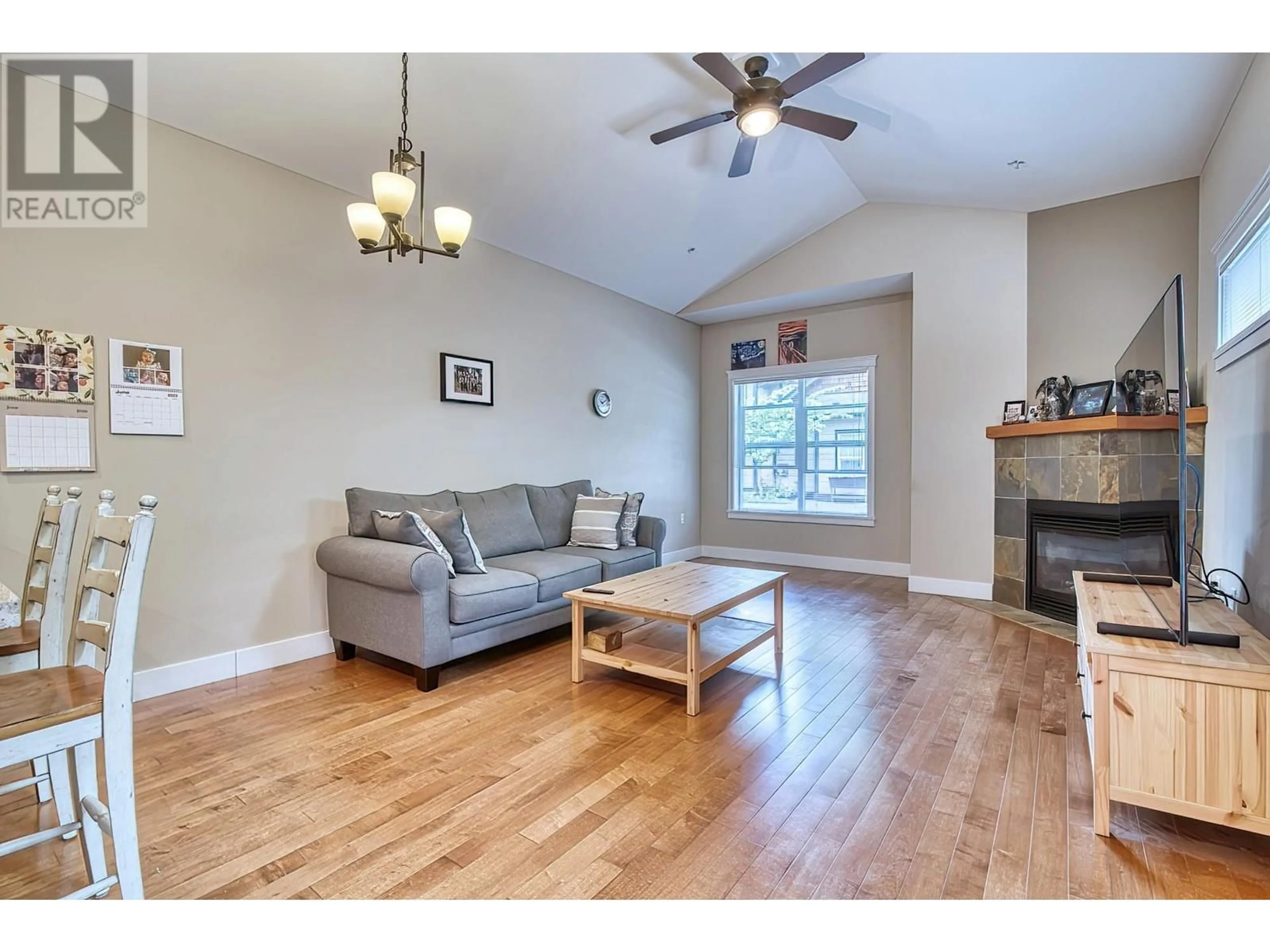 Living room with furniture, wood/laminate floor for 104 518 SHAW ROAD, Gibsons British Columbia V0N1V8