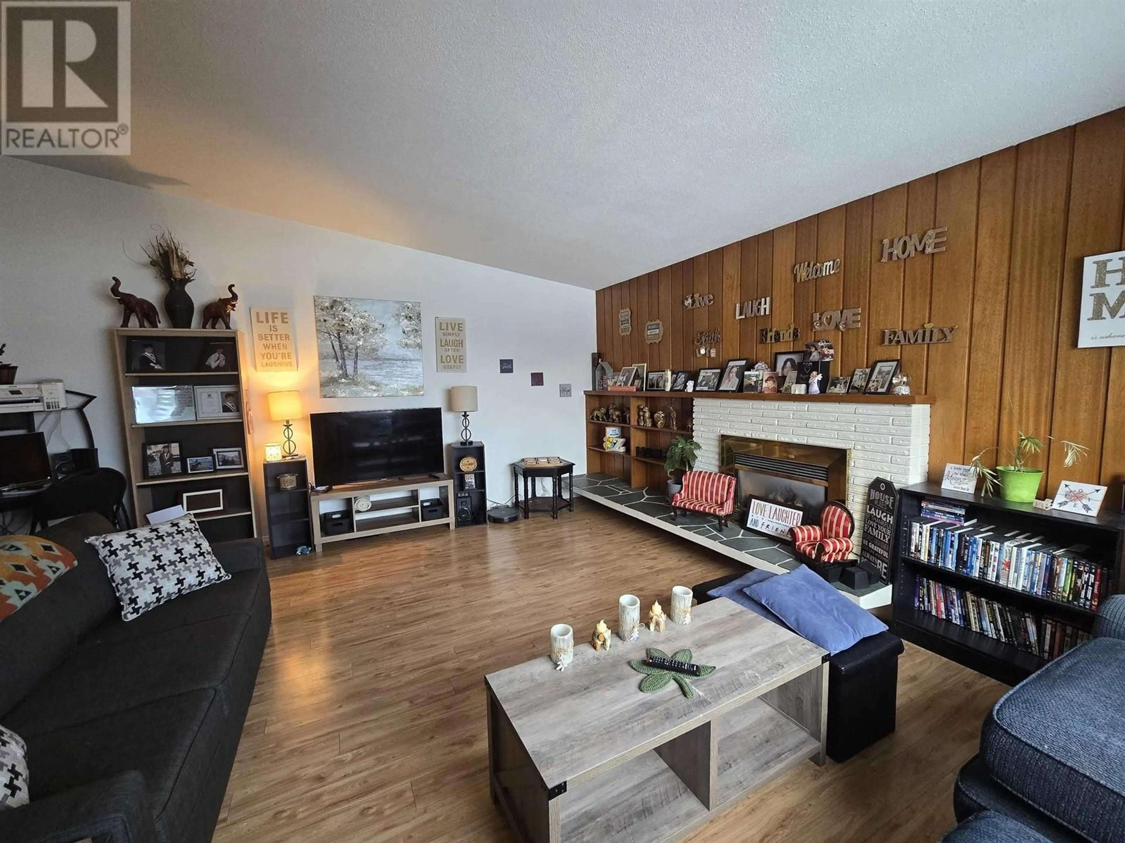 Living room with furniture, wood/laminate floor for 1221 BURDEN STREET, Prince George British Columbia V2M2J3