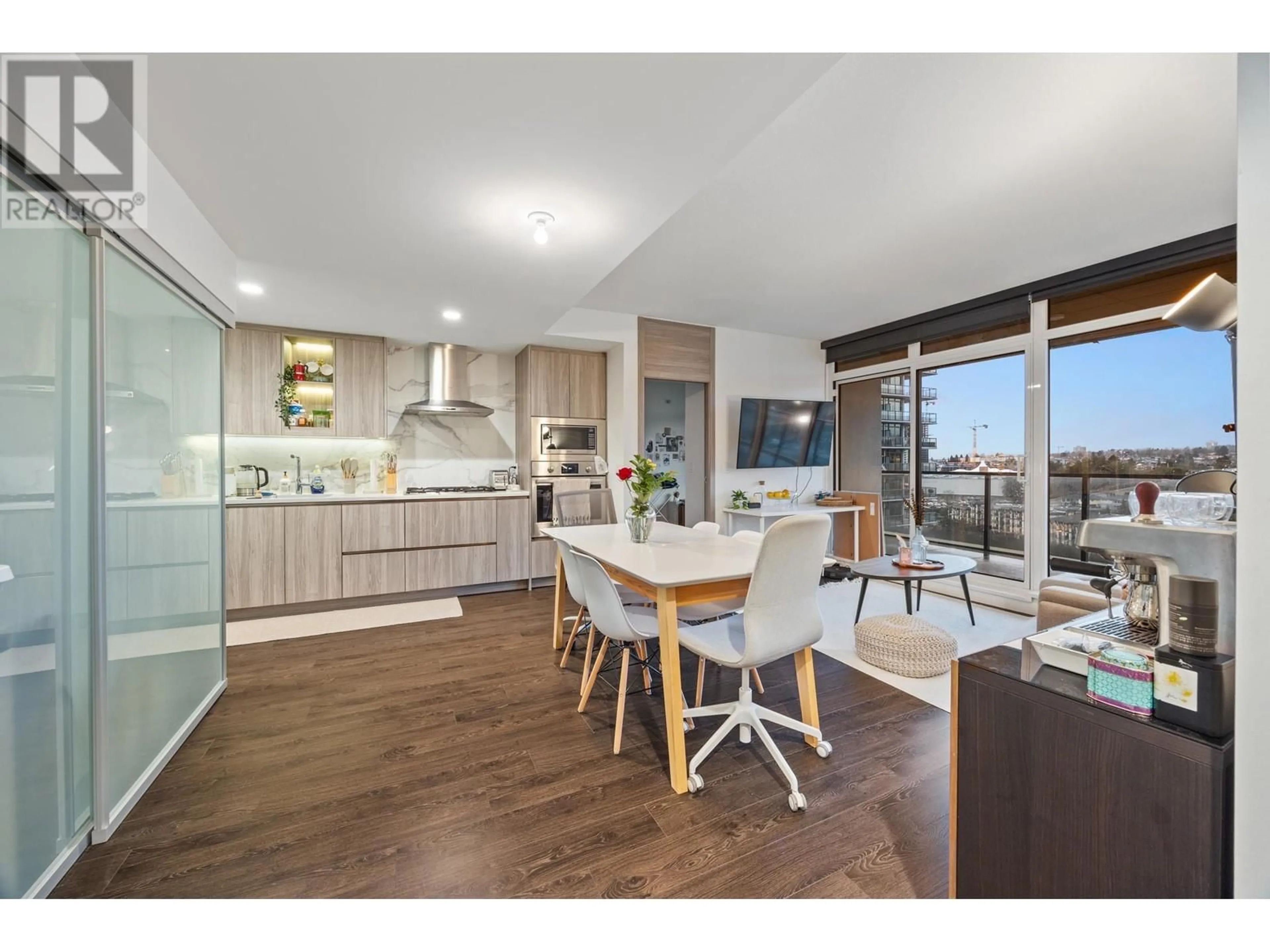 Open concept kitchen, wood/laminate floor for 1303 - 4880 LOUGHEED HIGHWAY, Burnaby British Columbia V5C0N1