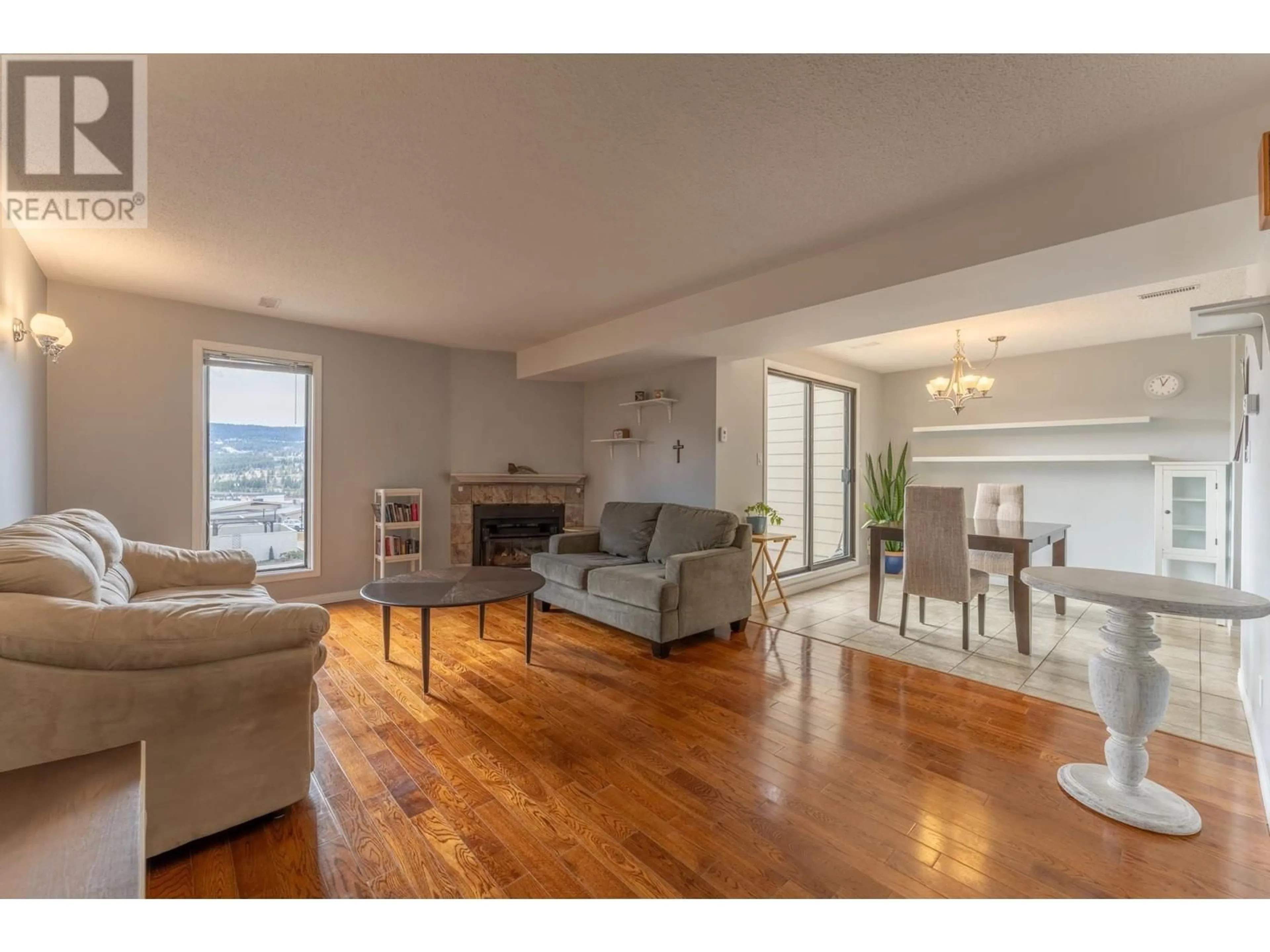 Living room with furniture, wood/laminate floor for 28 - 800 2ND AVENUE, Williams Lake British Columbia V2G4C4