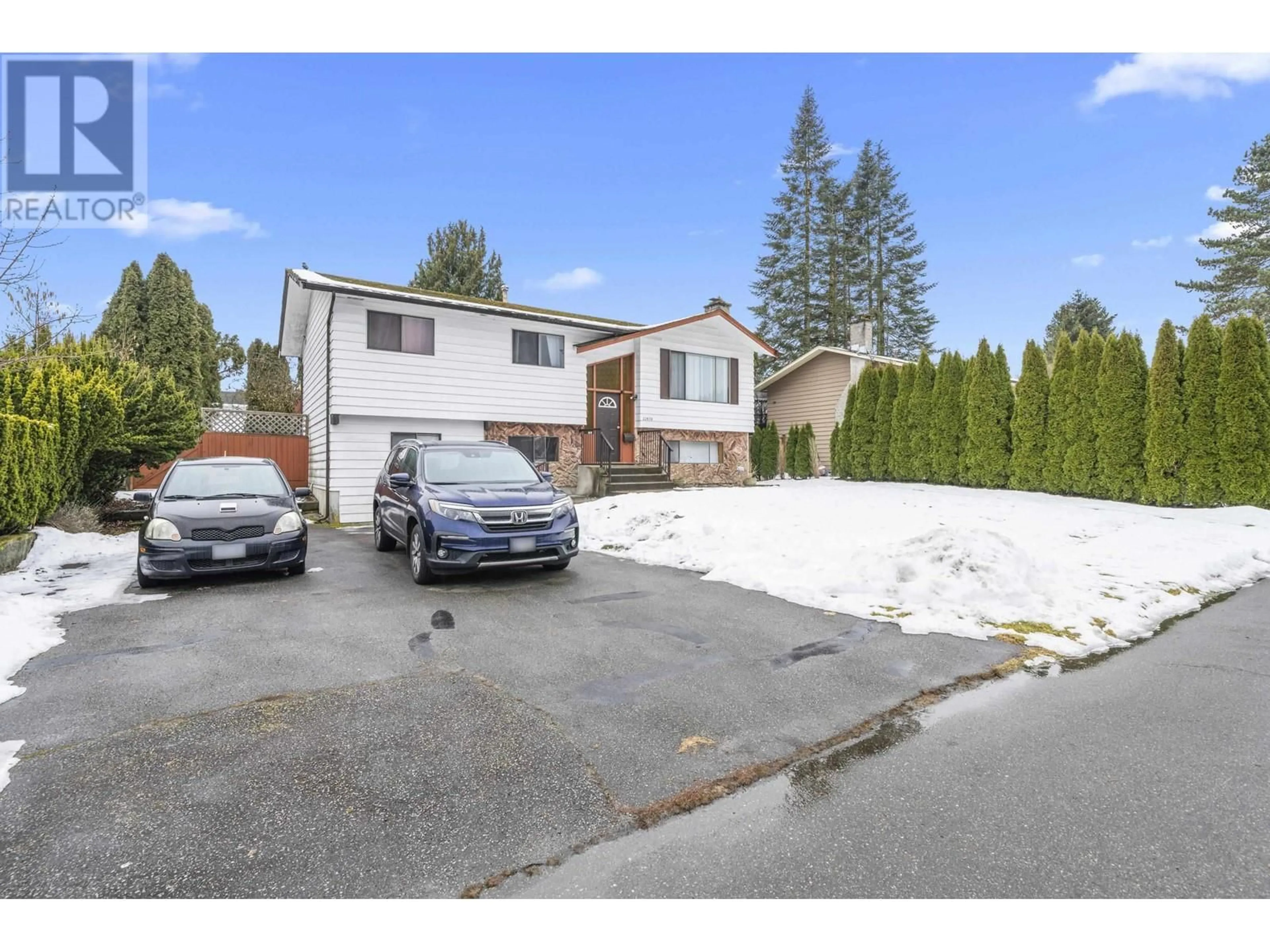 A pic from outside/outdoor area/front of a property/back of a property/a pic from drone, street for 22970 STOREY AVENUE, Maple Ridge British Columbia V2X3W1