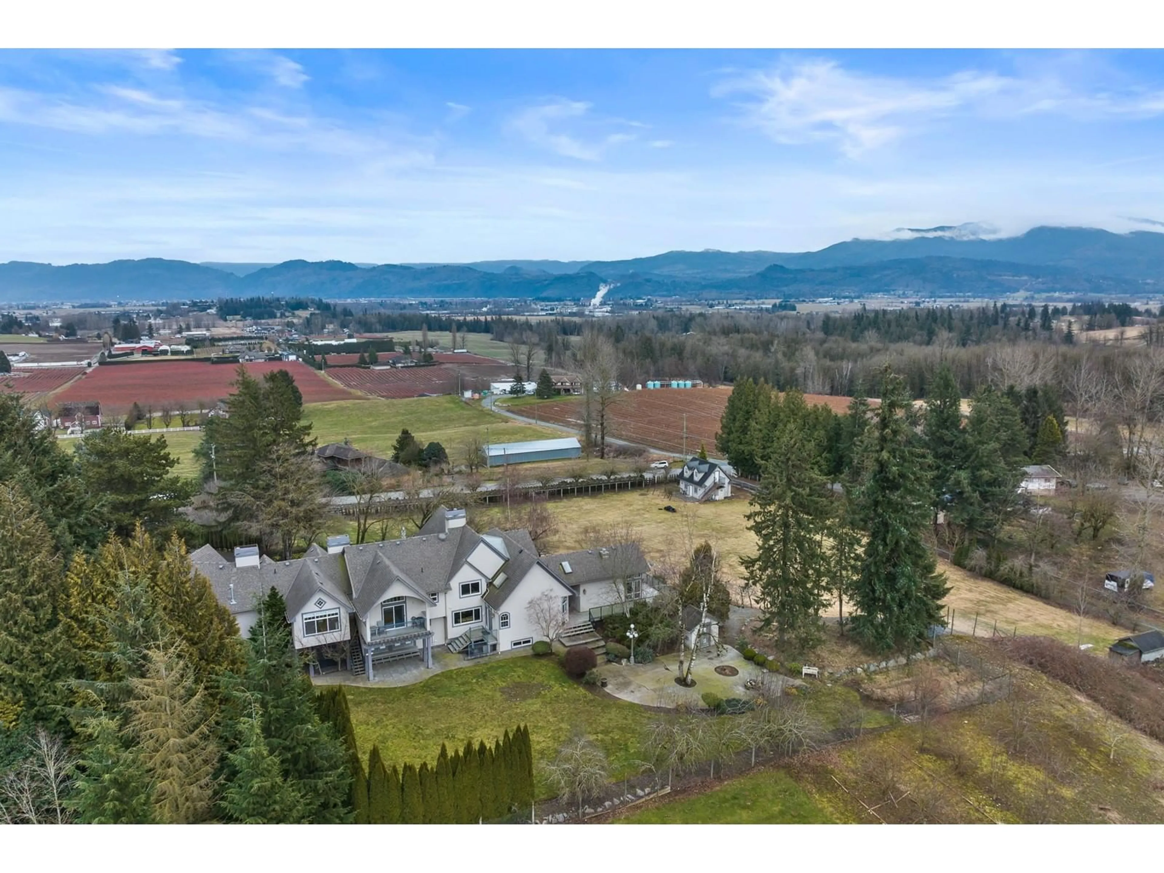 A pic from outside/outdoor area/front of a property/back of a property/a pic from drone, mountain view for 141 GLADWIN ROAD, Abbotsford British Columbia V2T5Y1