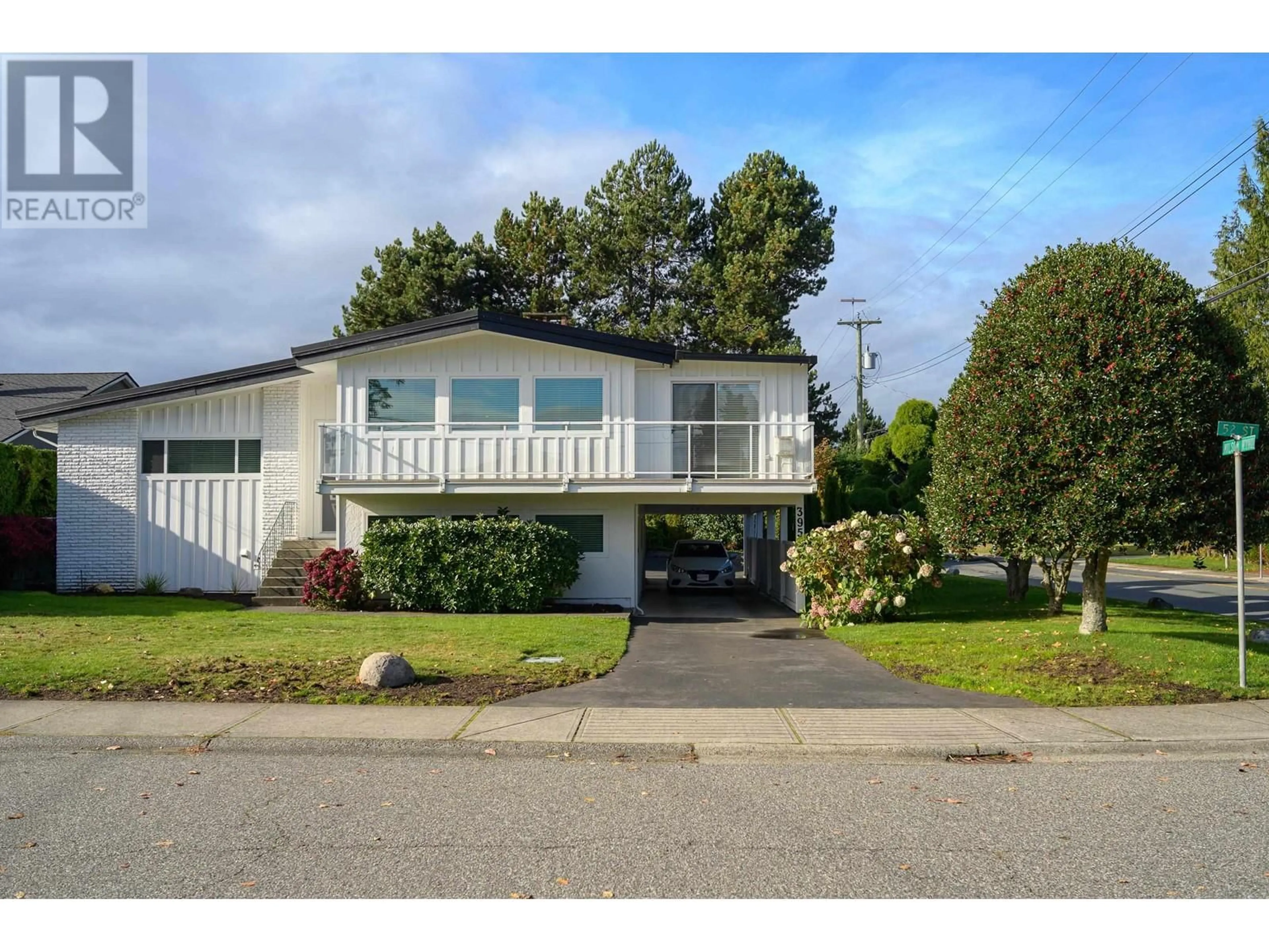 Home with vinyl exterior material, street for 395 52 STREET, Delta British Columbia V4M2Y5