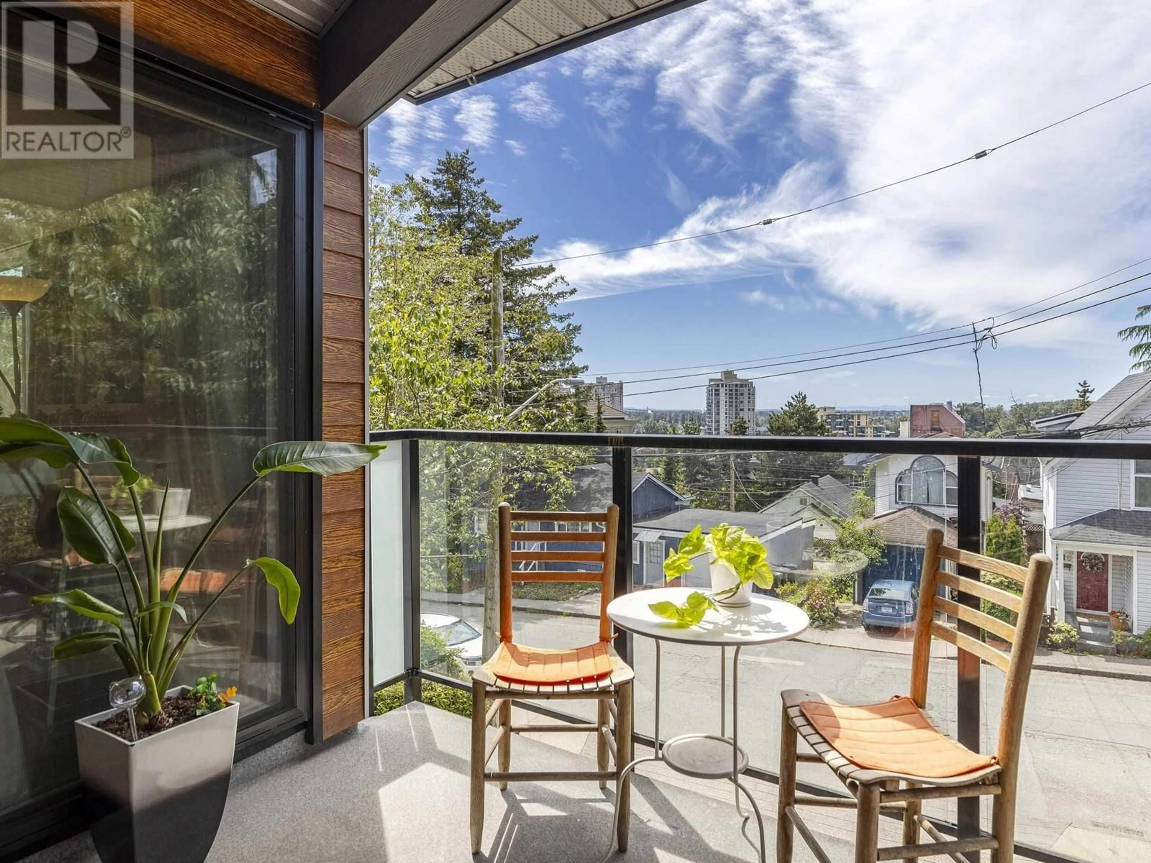 Balcony in the apartment, city buildings view from balcony for 205 215 MOWAT STREET, New Westminster British Columbia V3M4B1