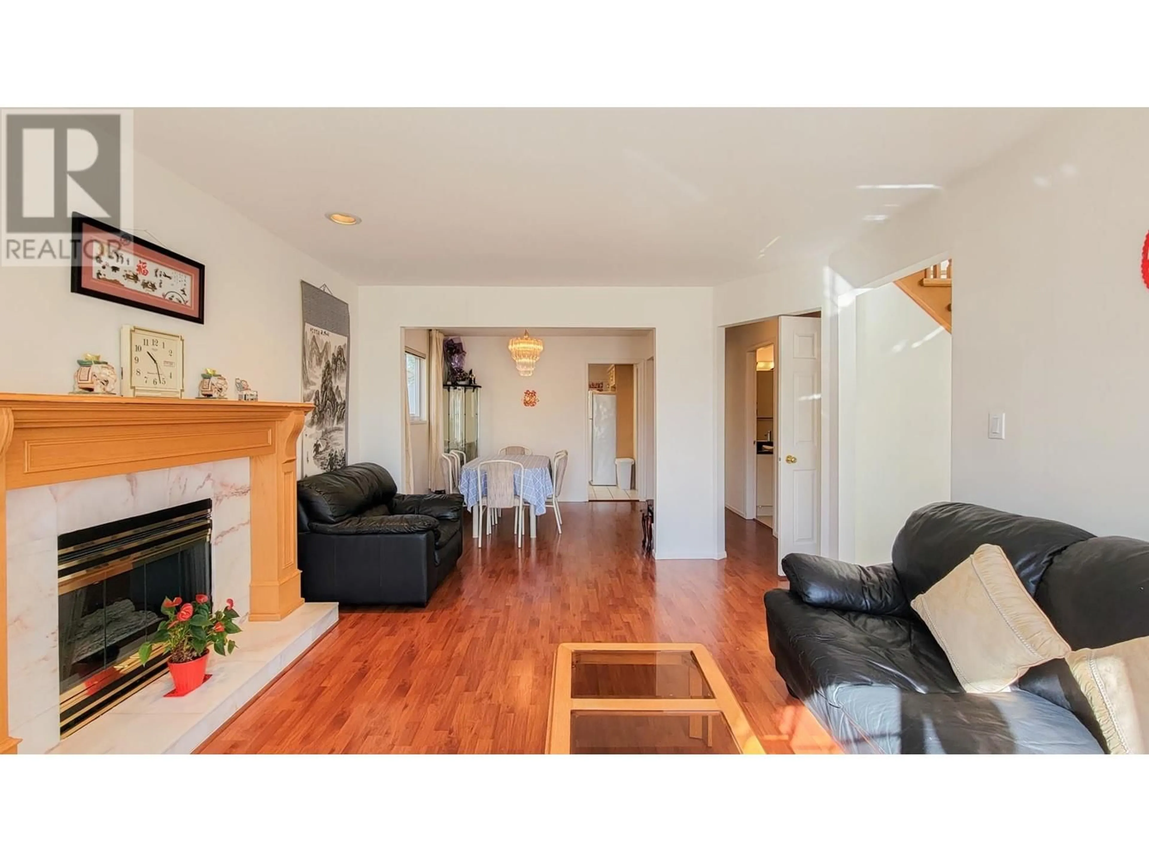 Living room with furniture, wood/laminate floor for 7607 OSLER STREET, Vancouver British Columbia V6P4C8