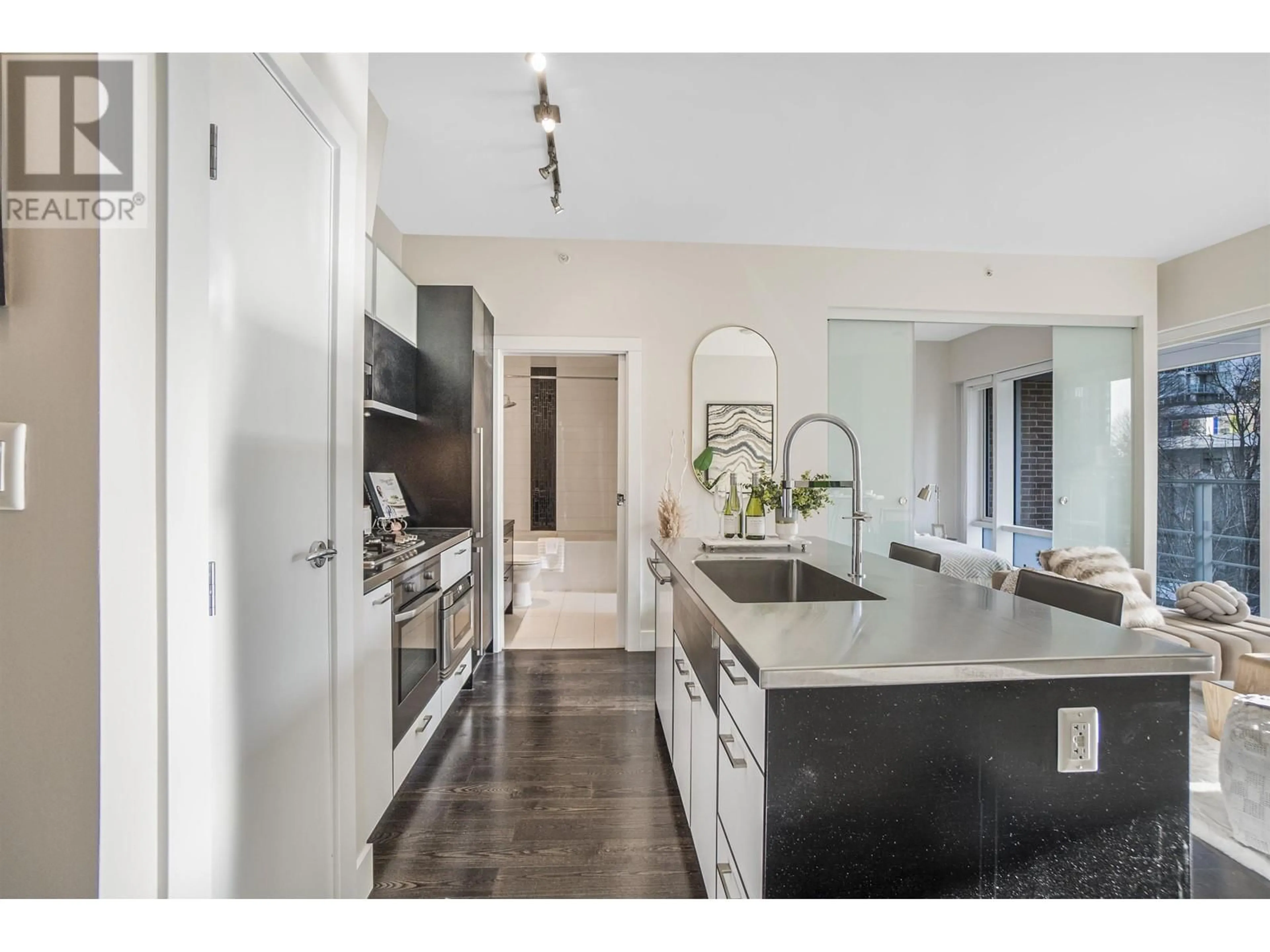 Contemporary kitchen, ceramic/tile floor for 206 535 SMITHE STREET, Vancouver British Columbia V6B0H2