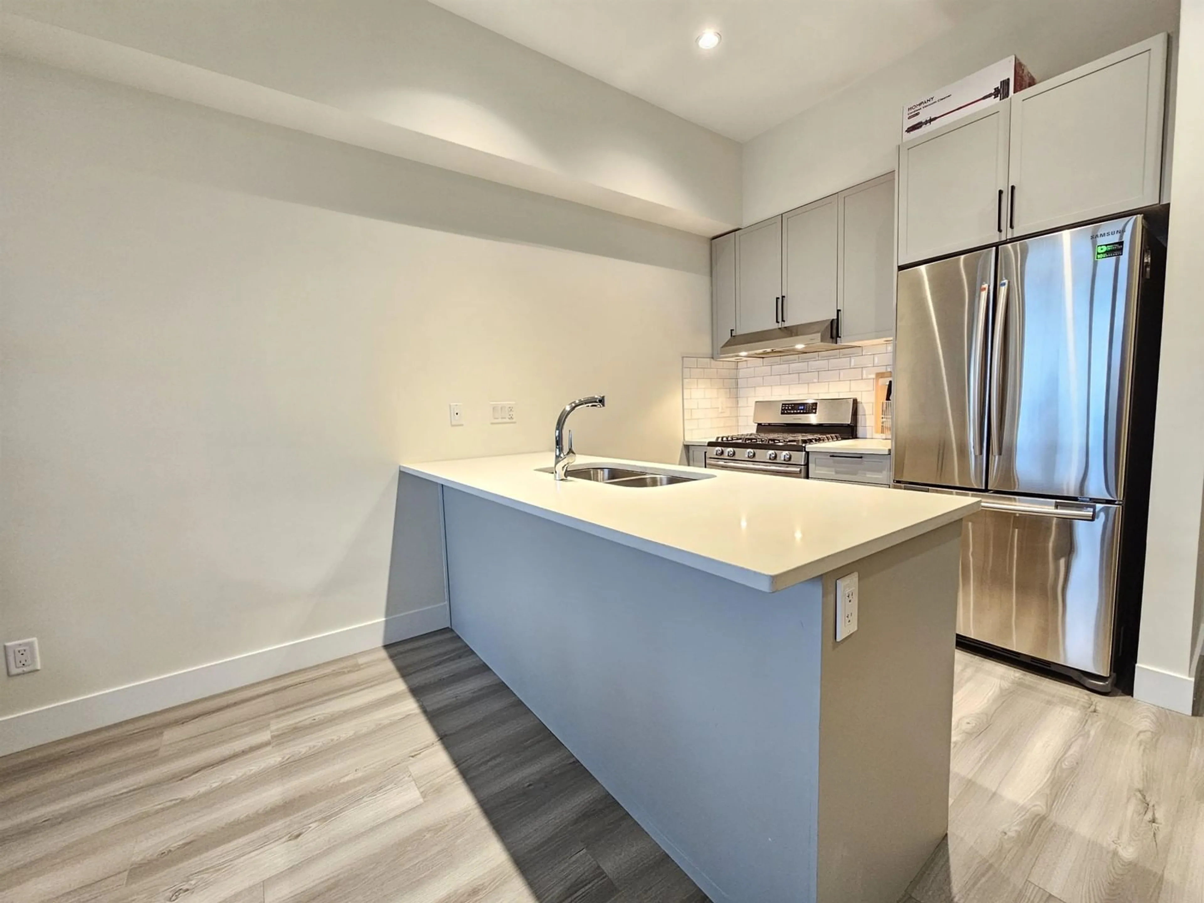 Open concept kitchen, unknown for 305 8488 160 STREET, Surrey British Columbia V4N0V7