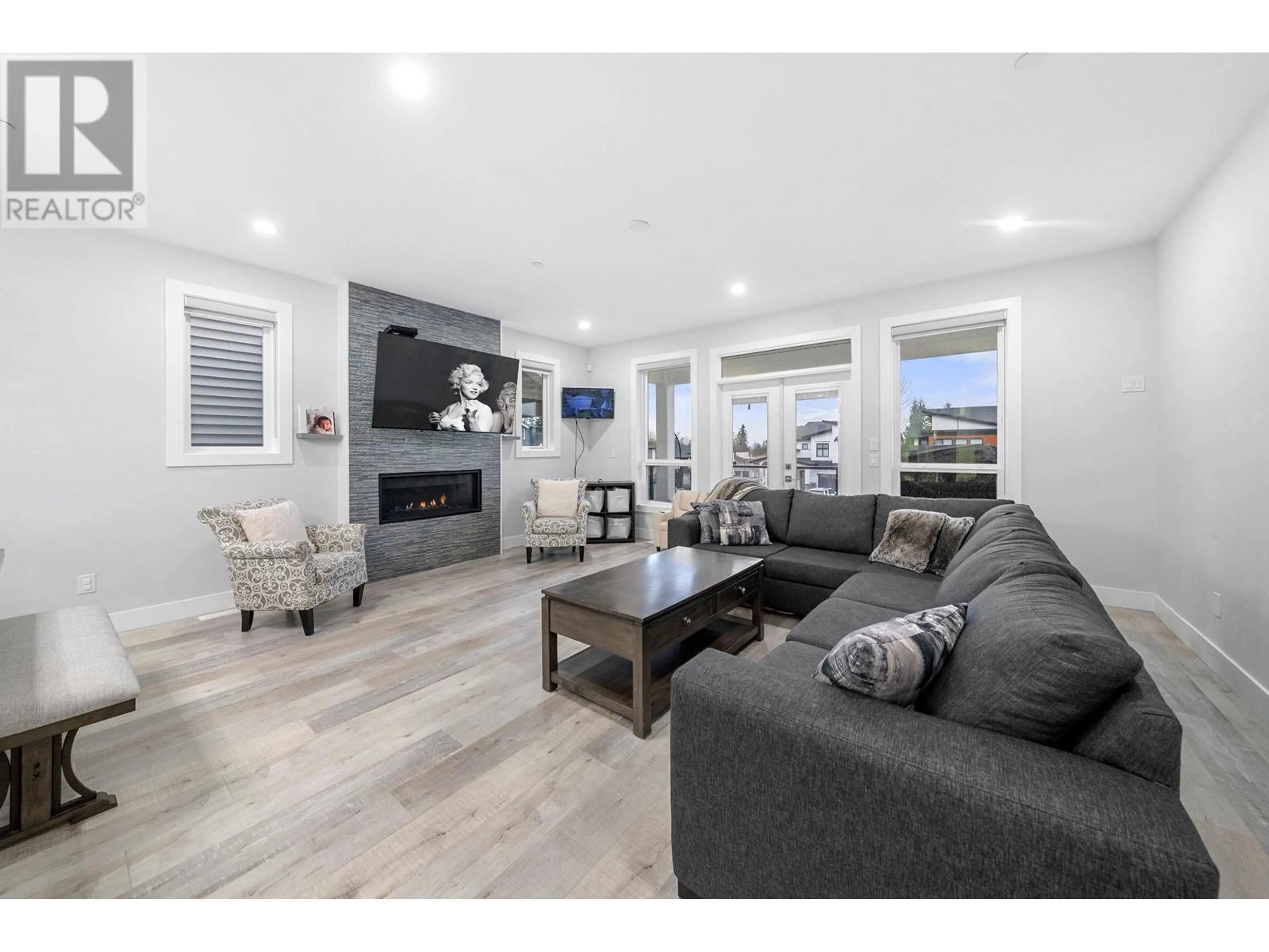 Living room with furniture, wood/laminate floor for 24629 105A AVENUE, Maple Ridge British Columbia V2W0K3