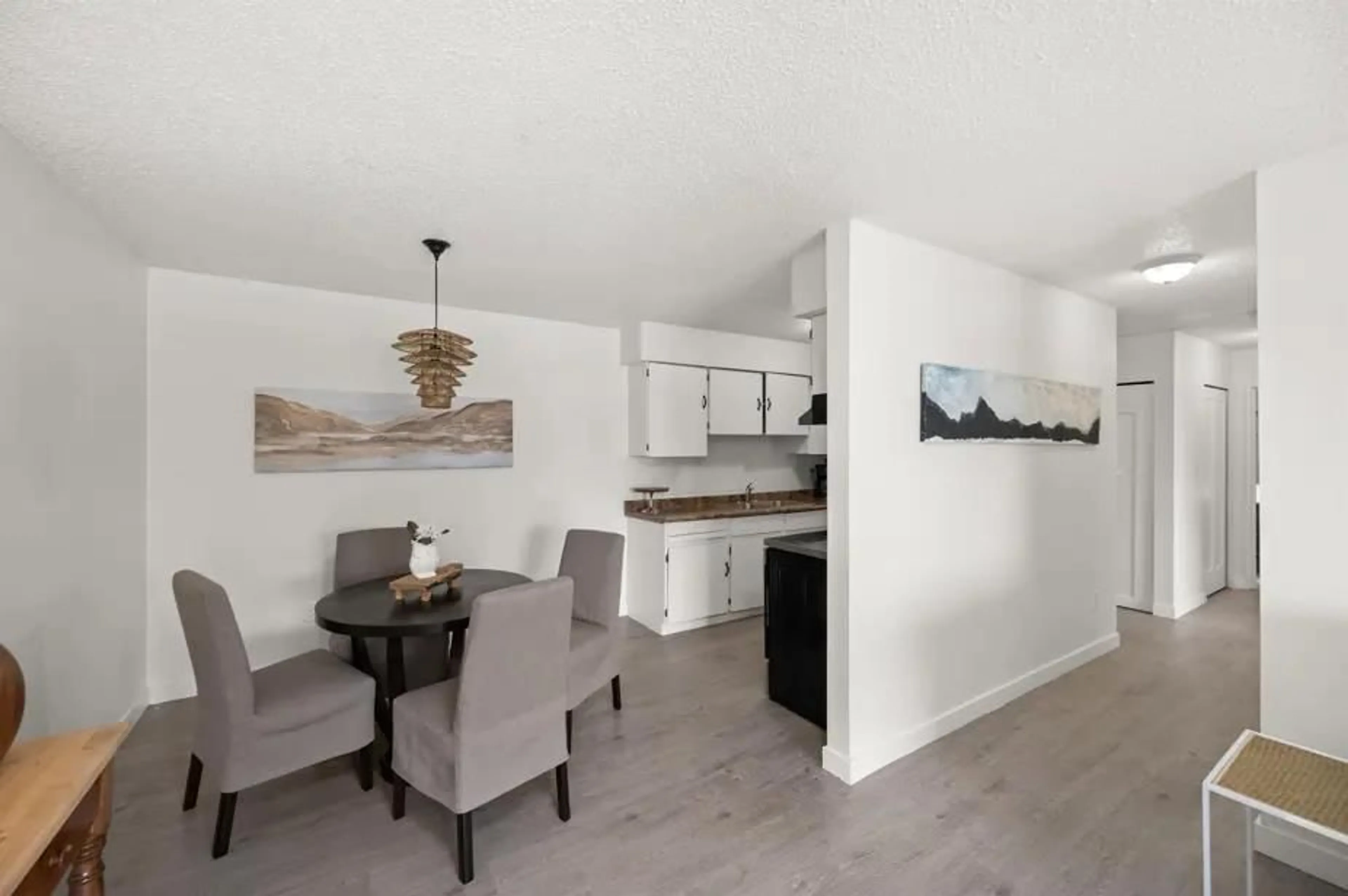 Open concept kitchen, wood/laminate floor for 322 - 45598 MCINTOSH DRIVE, Chilliwack British Columbia V2P7J3