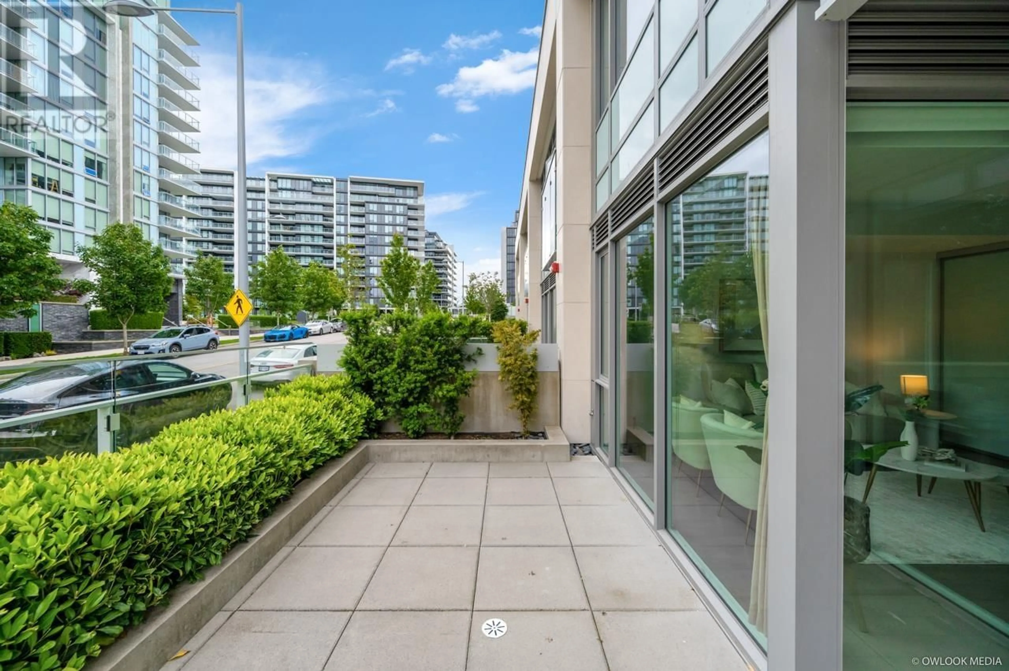 Patio, city buildings view from balcony for 105 - 6622 PEARSON WAY, Richmond British Columbia V7C0E4