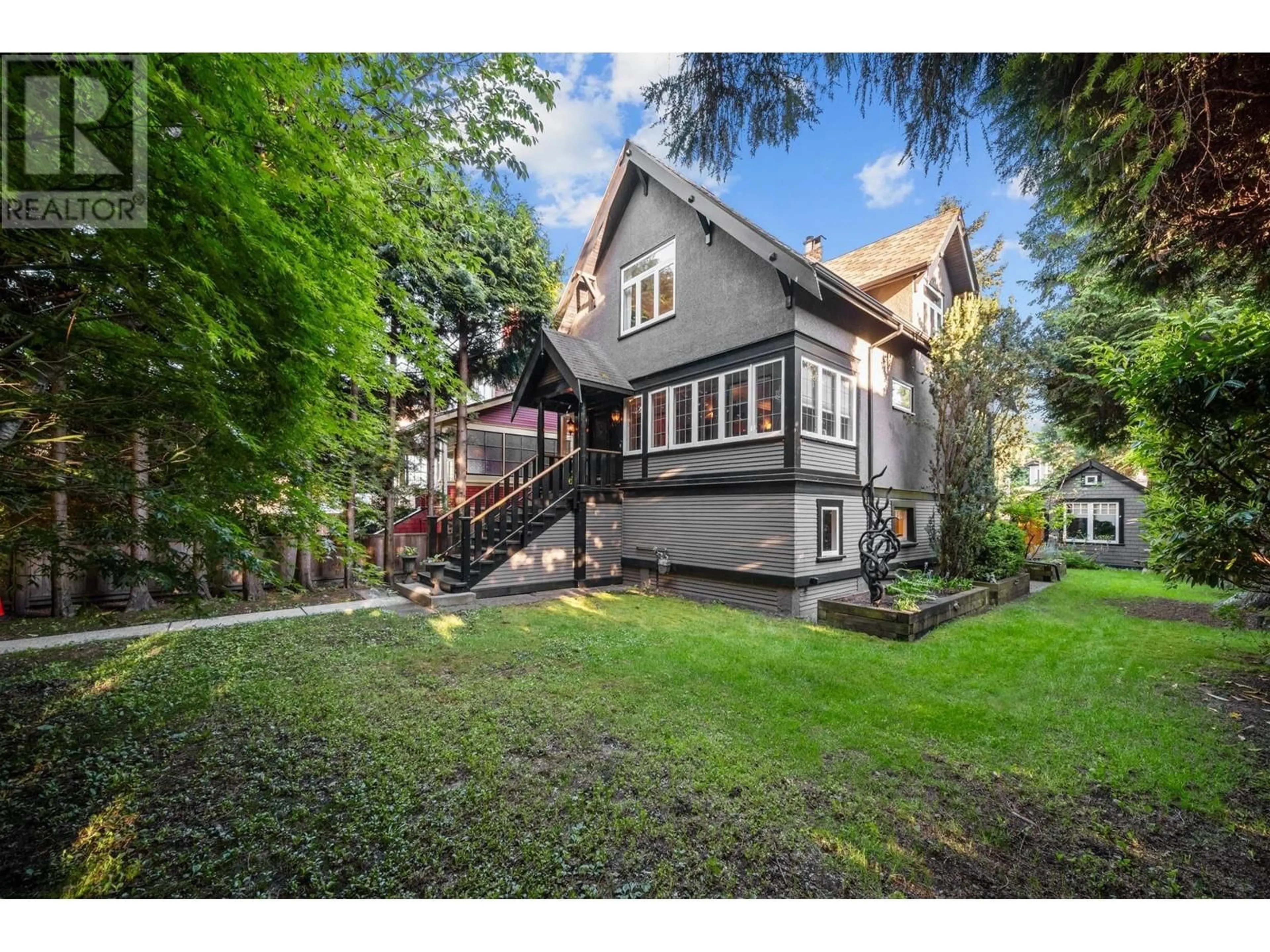 A pic from outside/outdoor area/front of a property/back of a property/a pic from drone, street for 2066 W 42ND AVENUE, Vancouver British Columbia V6M2B3