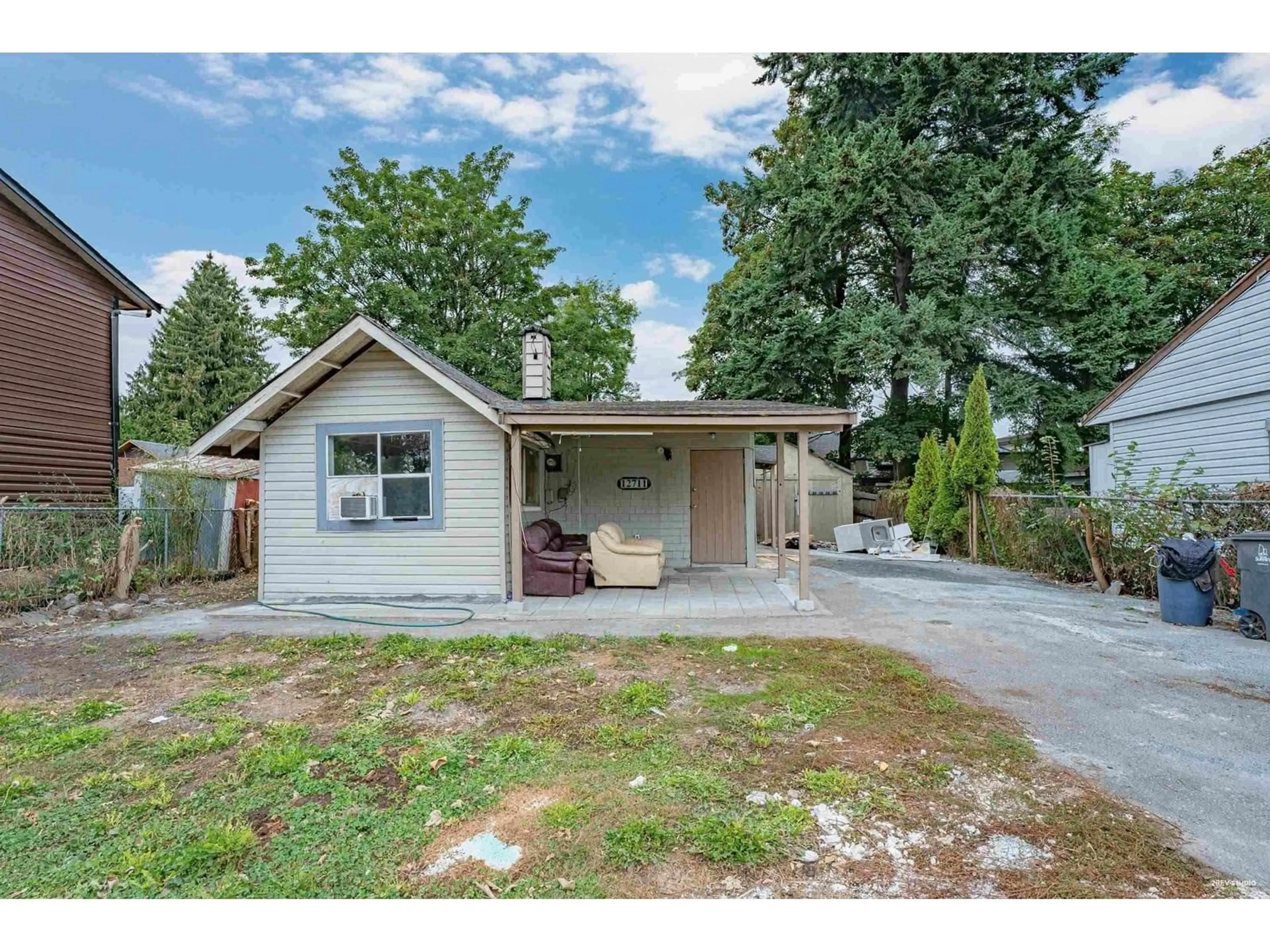 Home with vinyl exterior material, street for 12711 115A, Surrey British Columbia V3V3P9