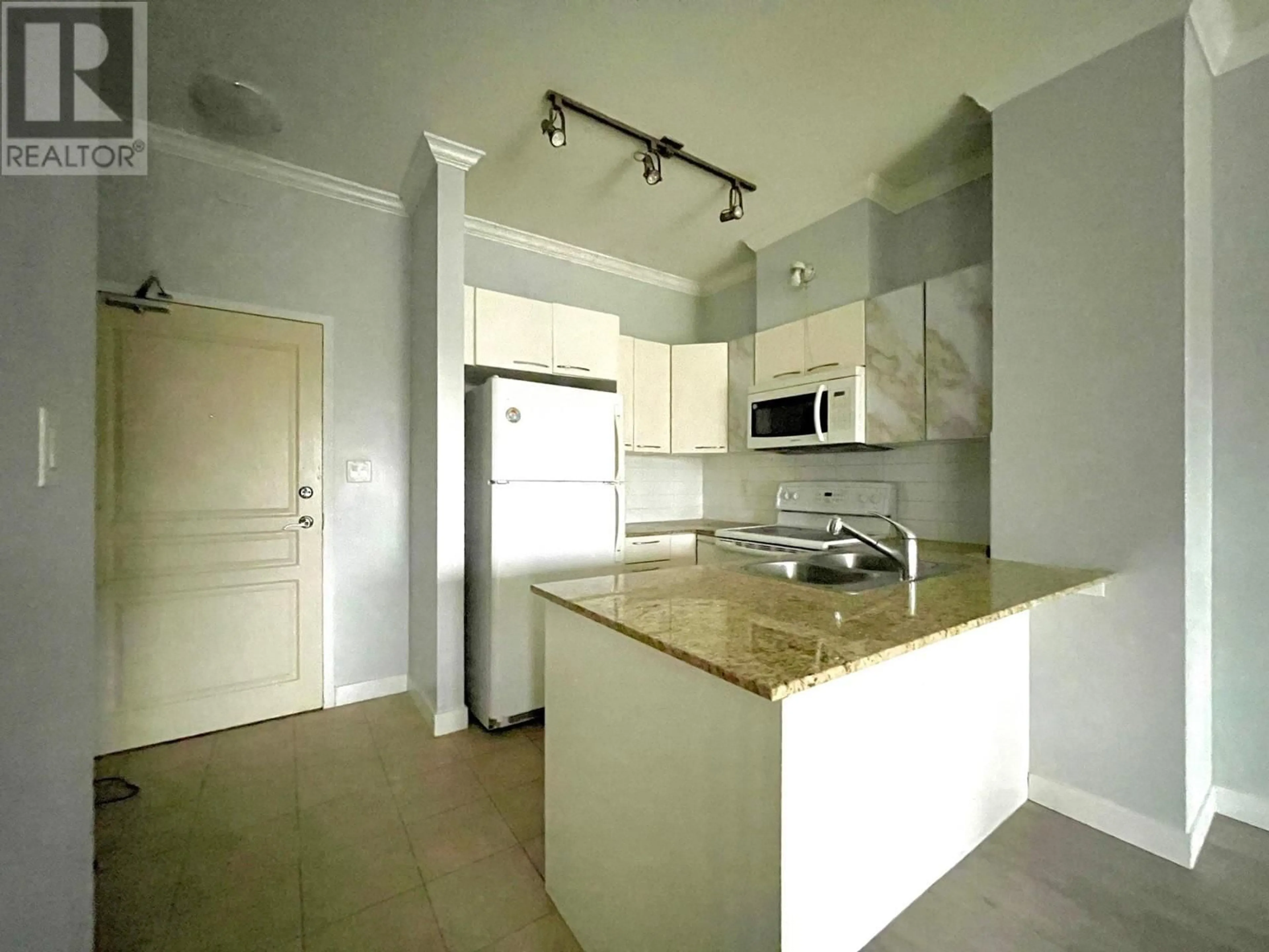 Standard kitchen, unknown for 210 4028 KNIGHT STREET, Vancouver British Columbia V5N5Y8