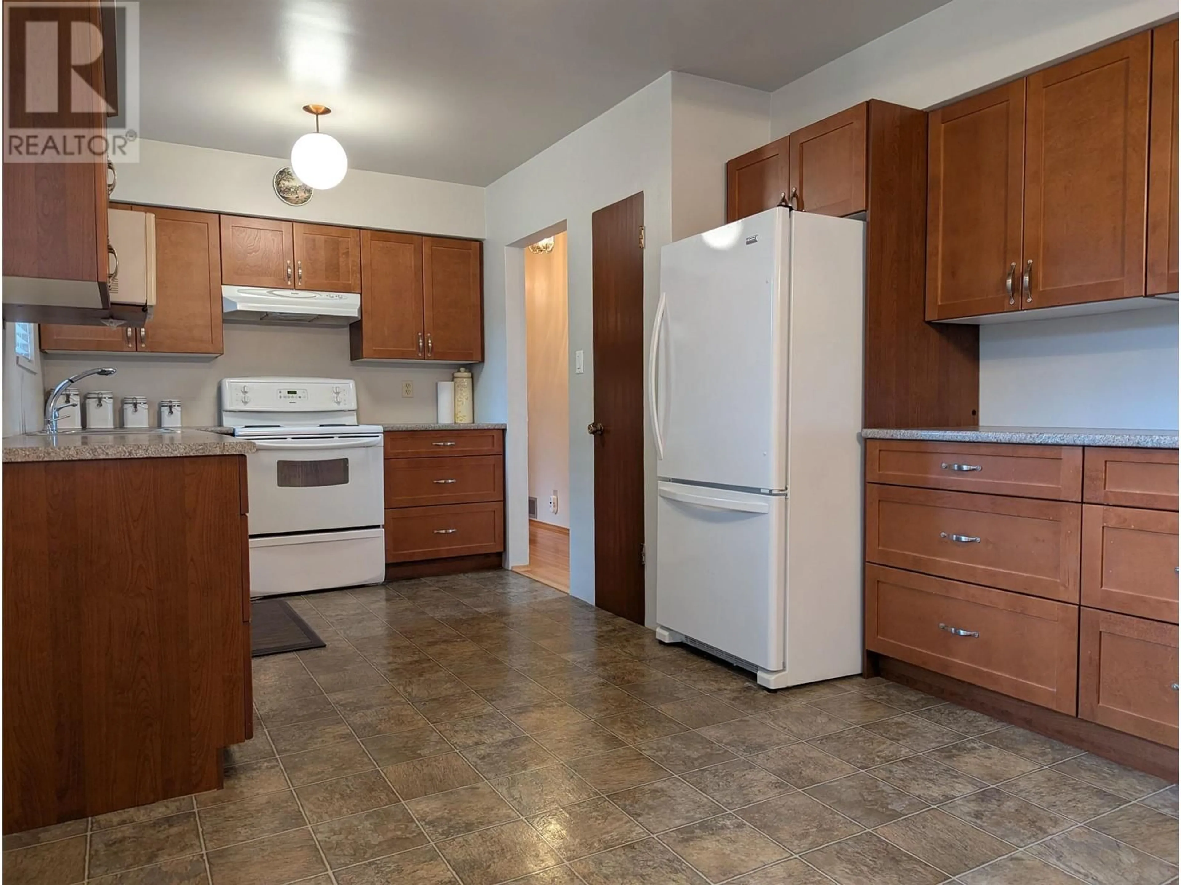 Standard kitchen, unknown for 7193 MAUREEN CRESCENT, Burnaby British Columbia V5A1H2