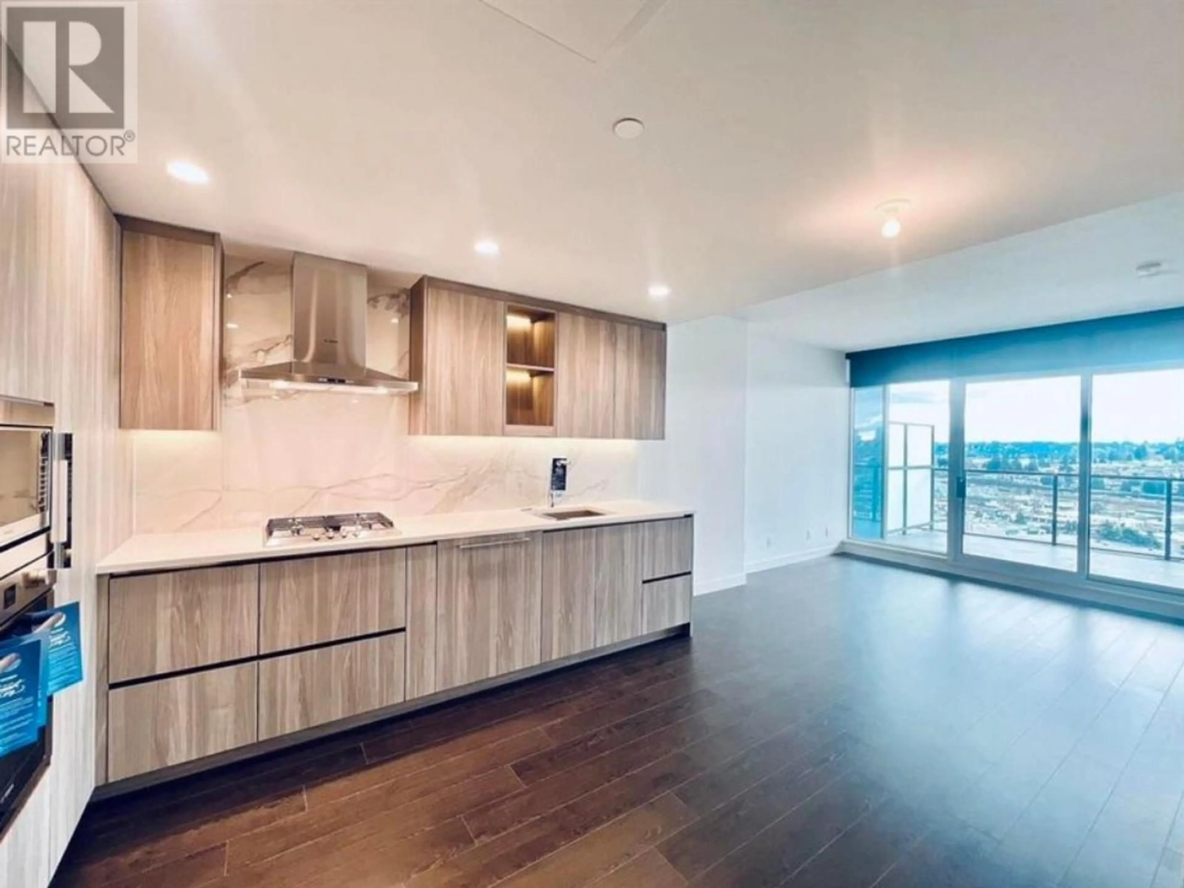 Open concept kitchen, wood/laminate floor for 1601 - 4890 LOUGHEED HIGHWAY, Burnaby British Columbia V5C0N2