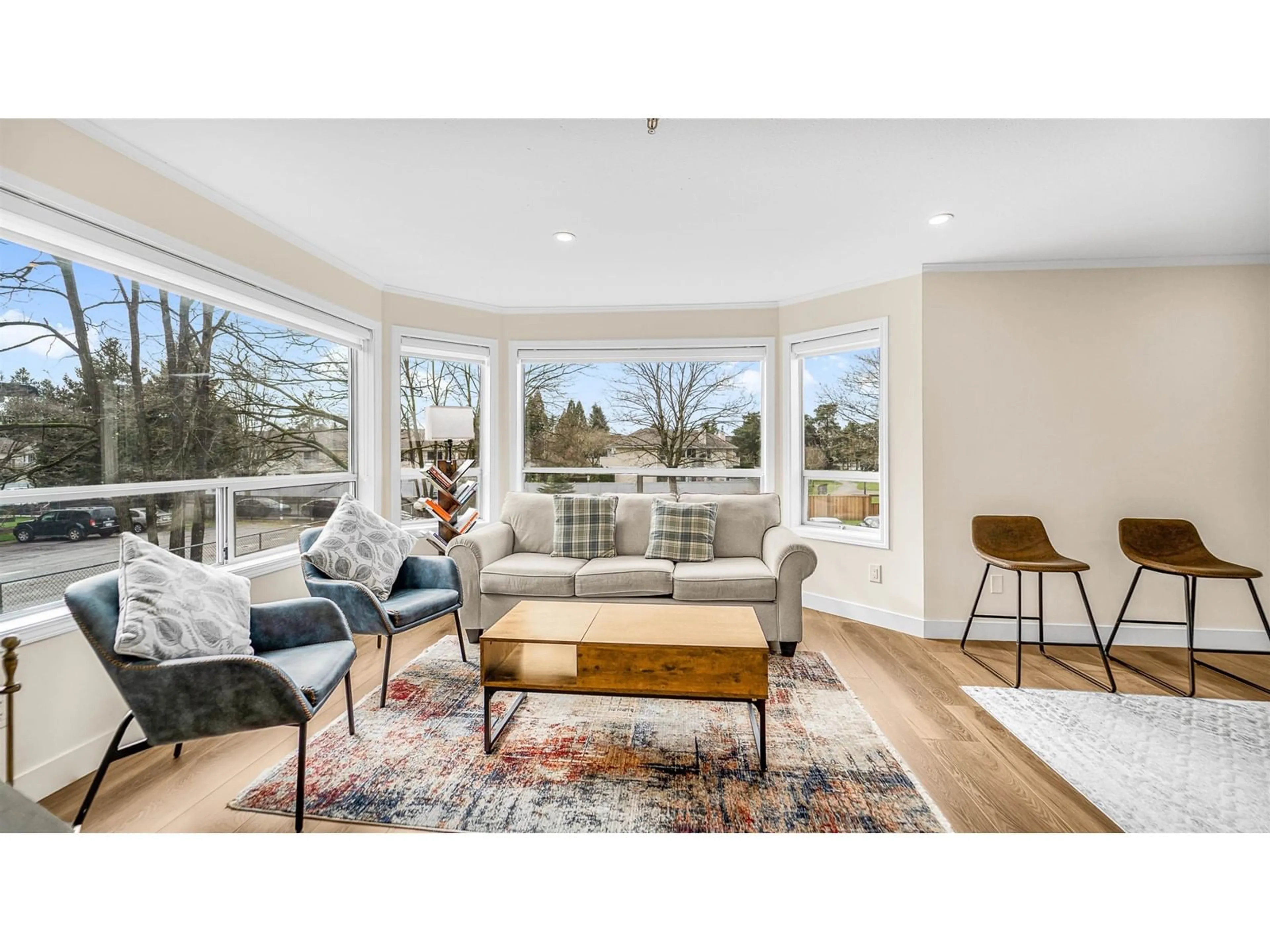 Living room with furniture, wood/laminate floor for 120 5710 201 STREET, Langley British Columbia V3A8A8