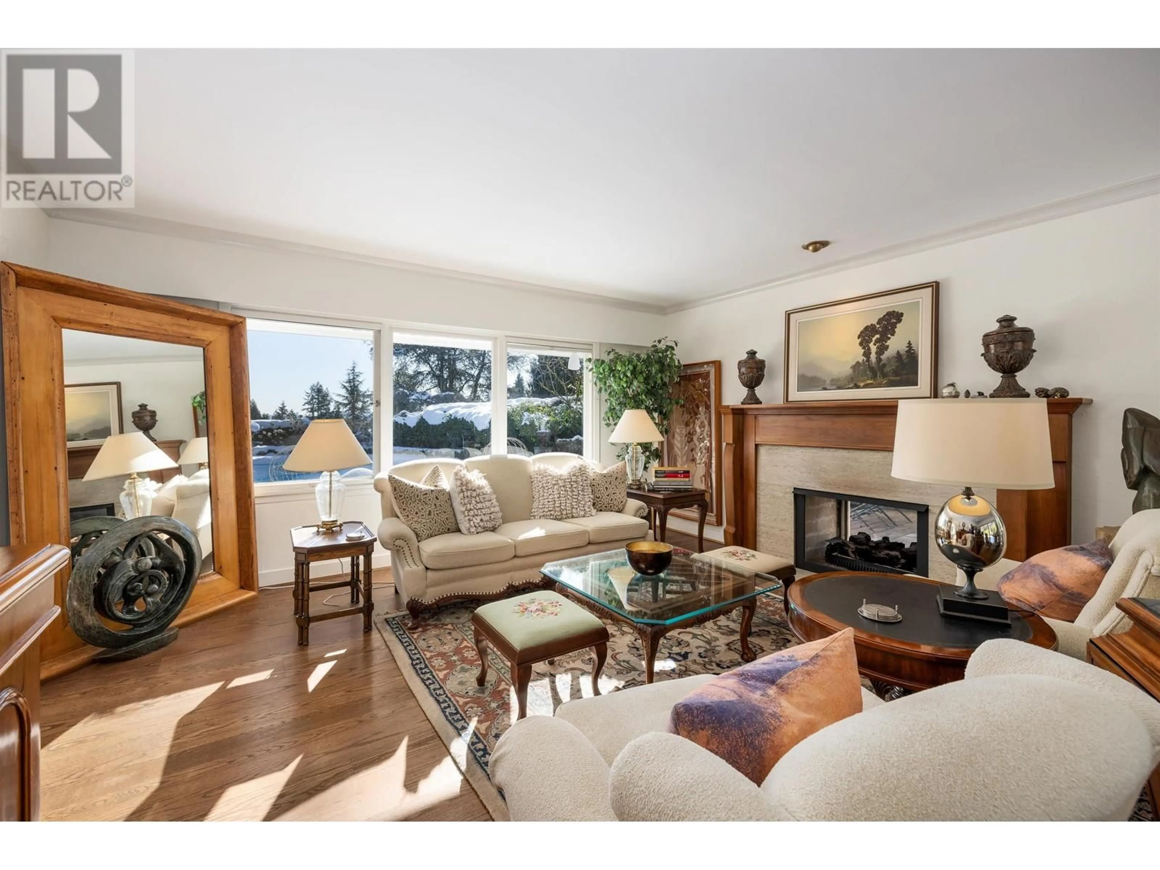 Living room with furniture, wood/laminate floor for 483 EASTCOT ROAD, West Vancouver British Columbia V7S1E3