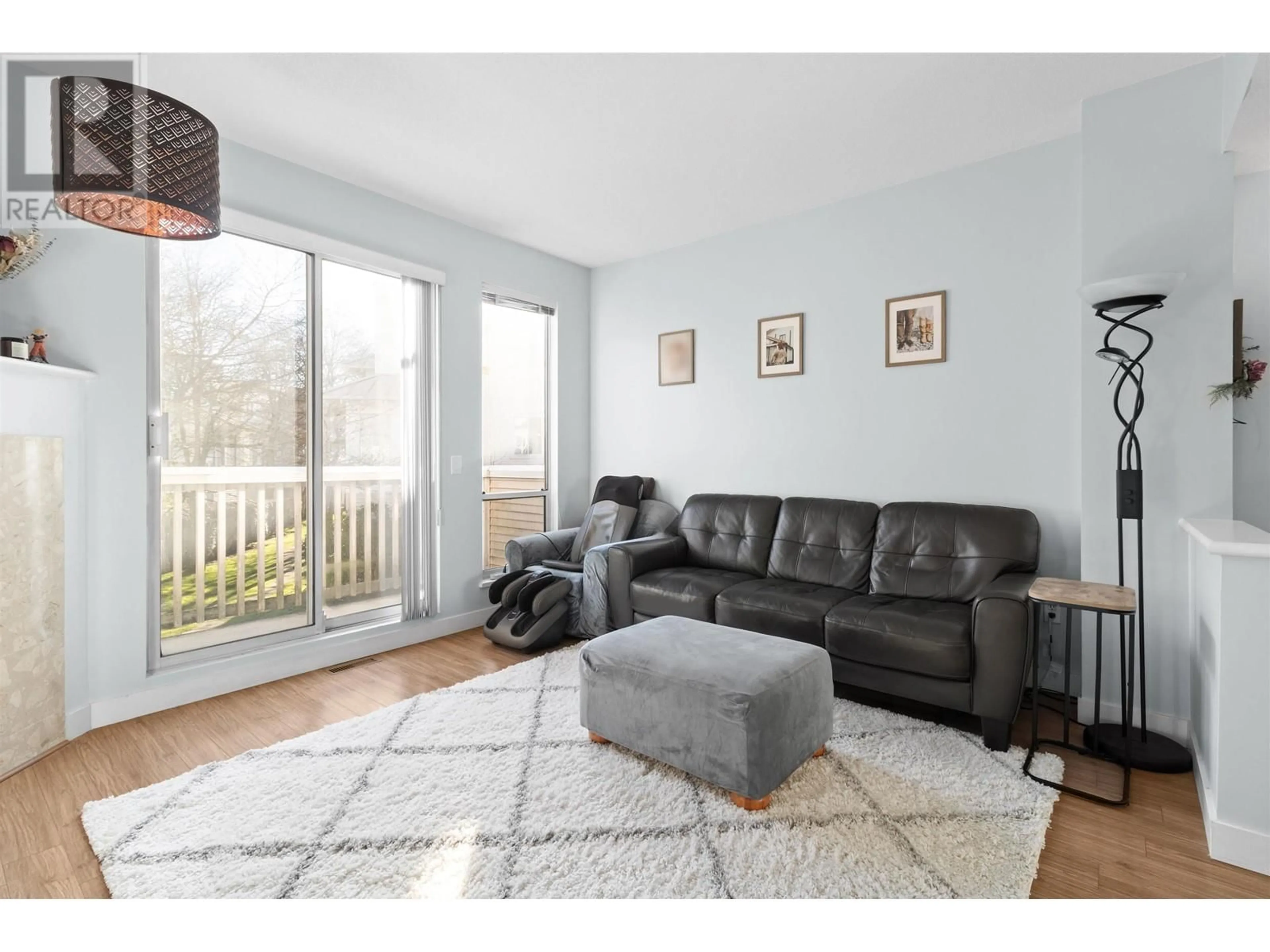 Living room with furniture, wood/laminate floor for 7 12920 JACK BELL DRIVE, Richmond British Columbia V6V2V9