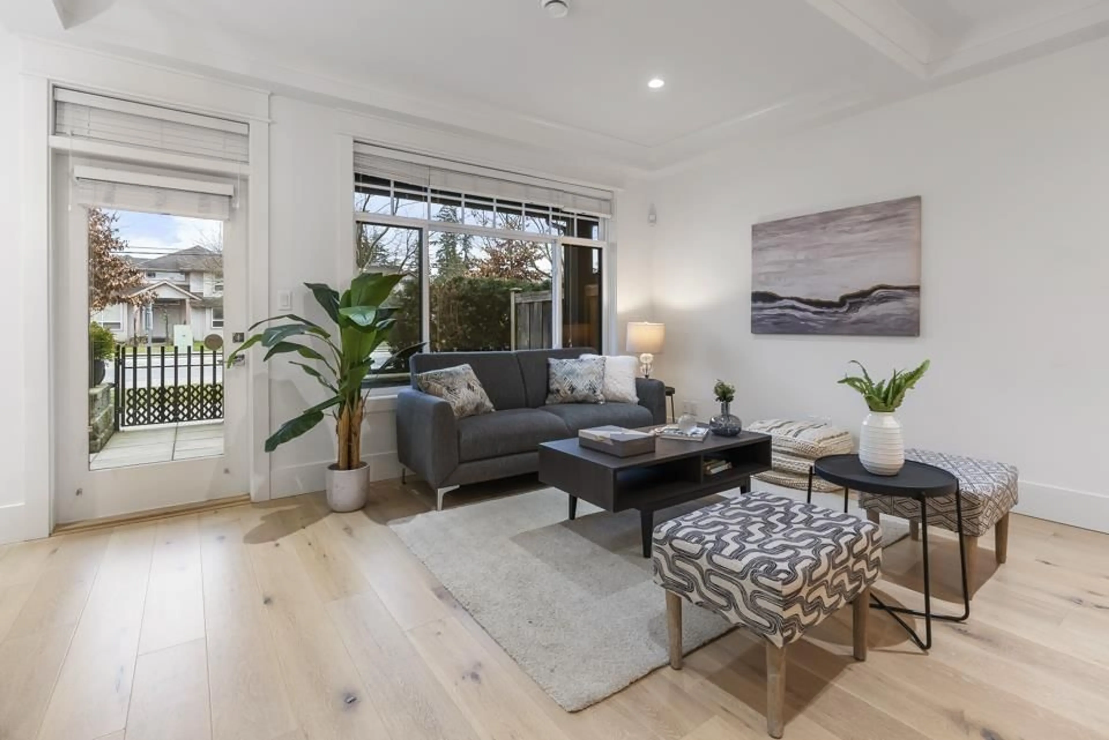 Living room with furniture, wood/laminate floor for 6 8425 VENTURE WAY, Surrey British Columbia V4N6S5