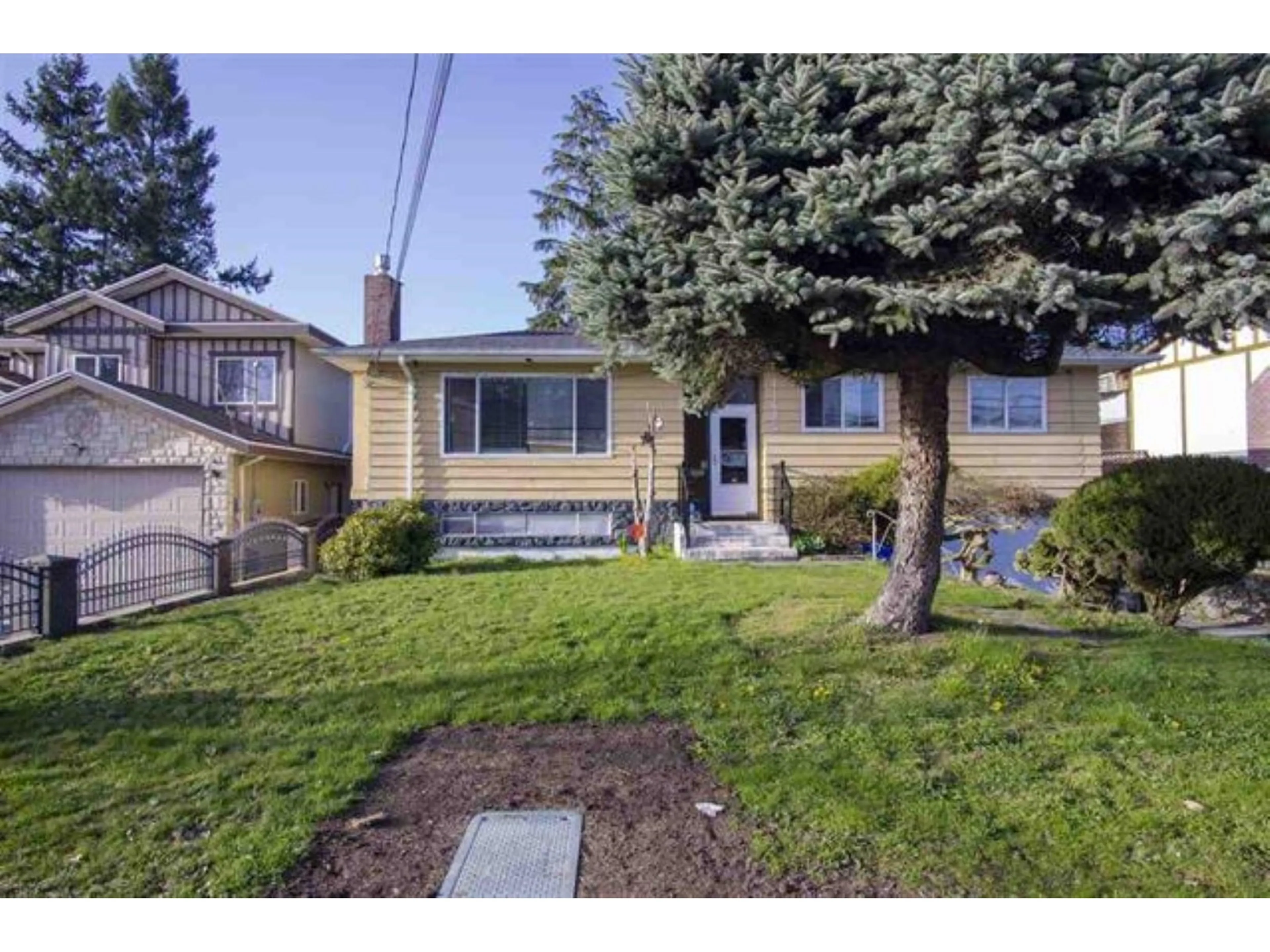 Home with vinyl exterior material, street for 11435 88, Delta British Columbia V4C3B8