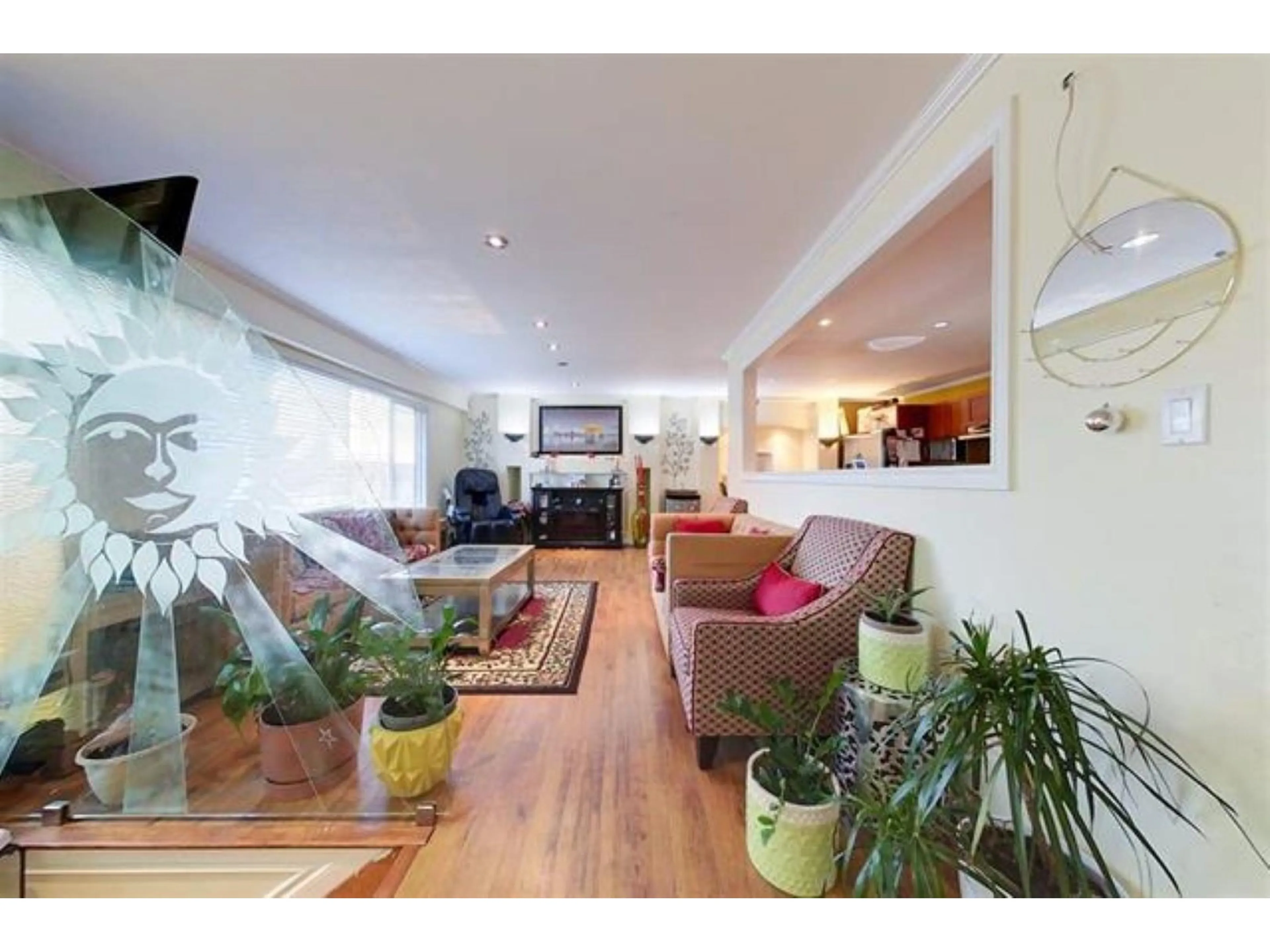 Living room with furniture, wood/laminate floor for 11435 88, Delta British Columbia V4C3B8