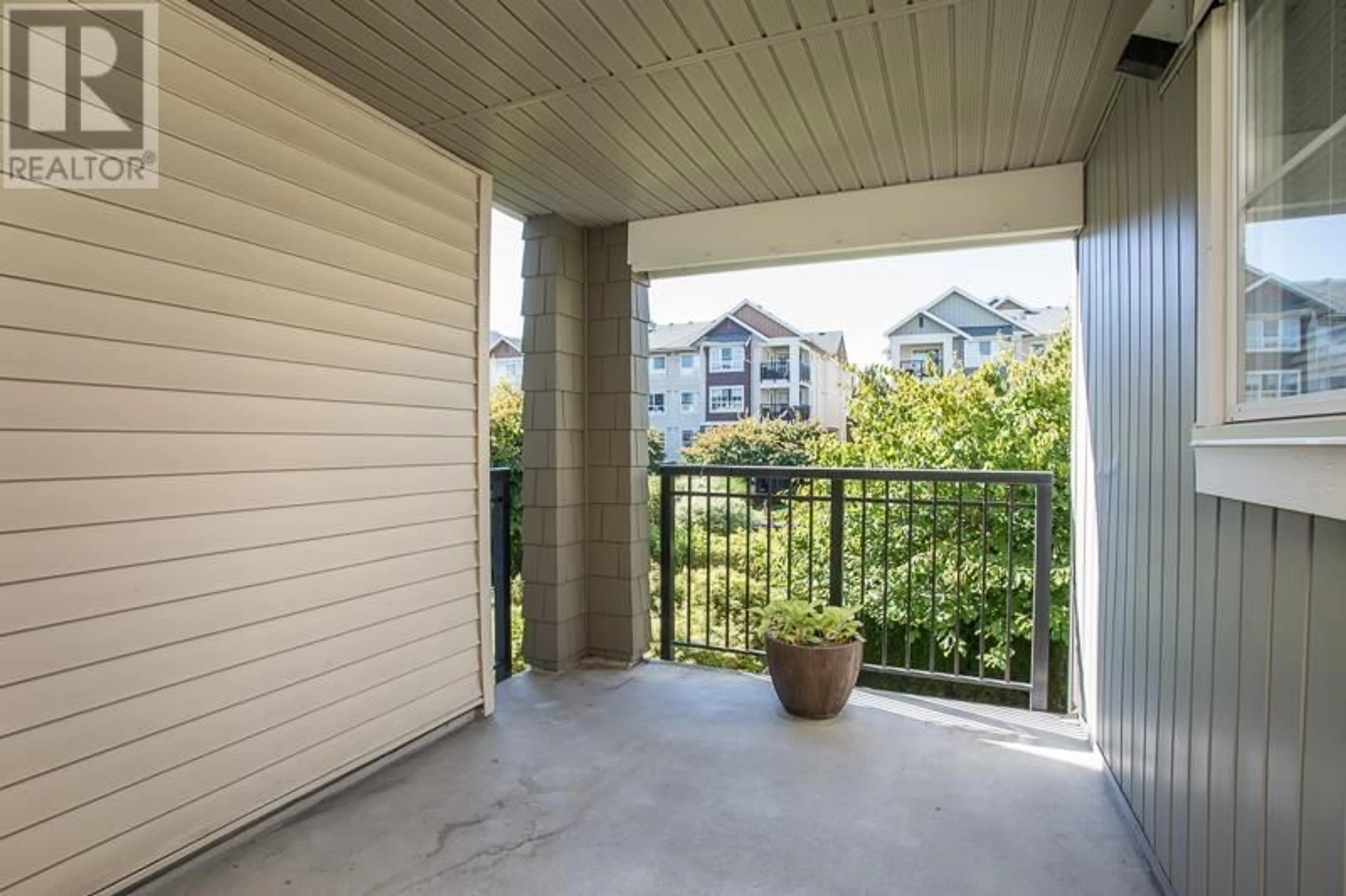 Patio, water/lake/river/ocean view for 202 19673 MEADOW GARDENS WAY, Pitt Meadows British Columbia V3Y0A1