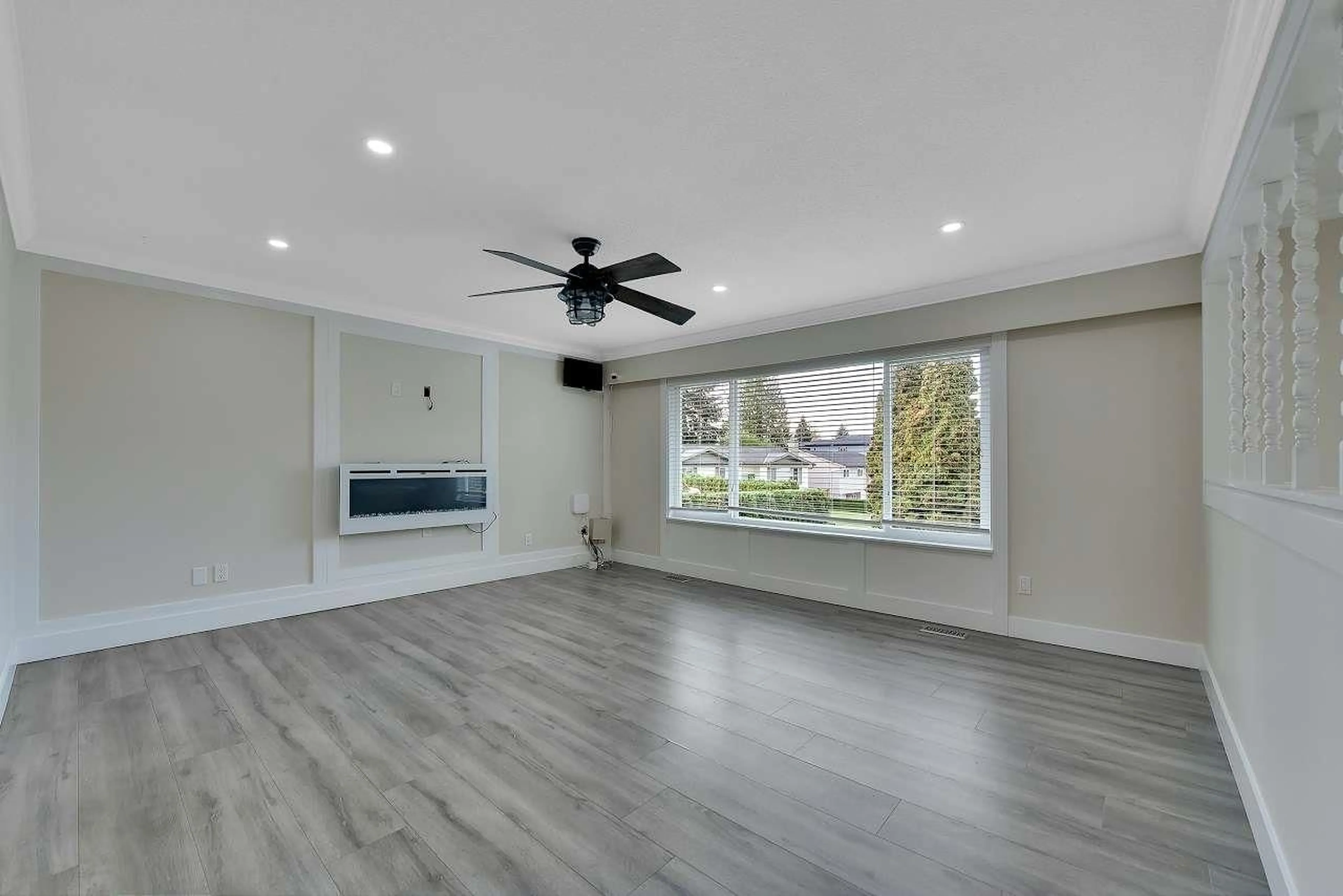 Living room with furniture, wood/laminate floor for 8328 111A STREET, Delta British Columbia V4C4S4