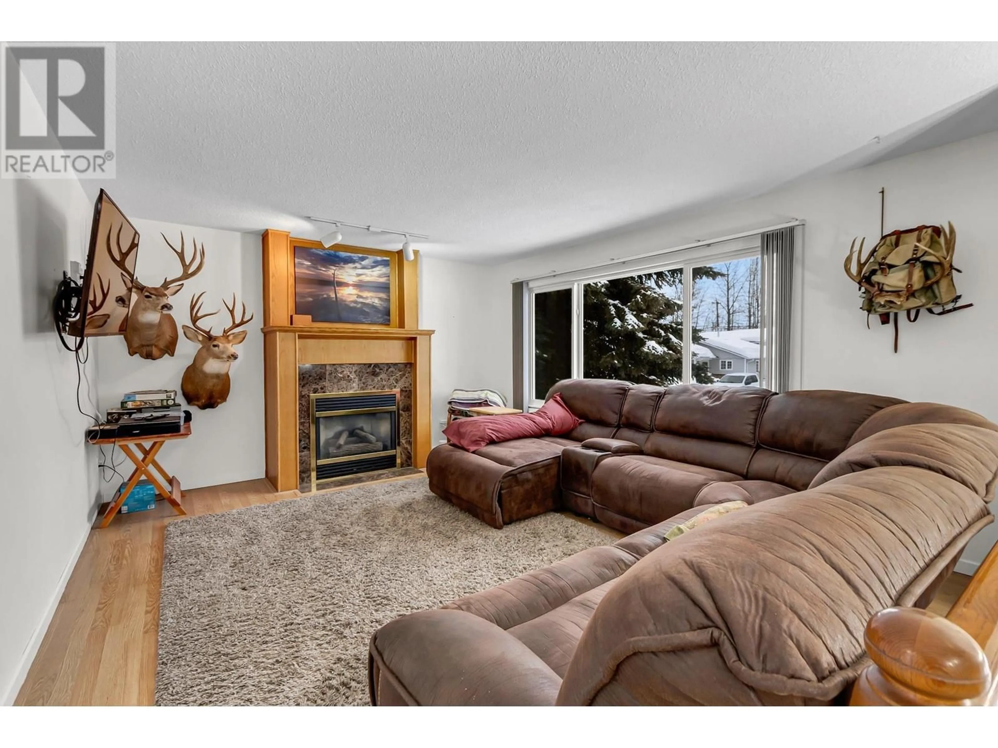 Living room with furniture, unknown for 6518 DRIFTWOOD ROAD, Prince George British Columbia V2K4E4