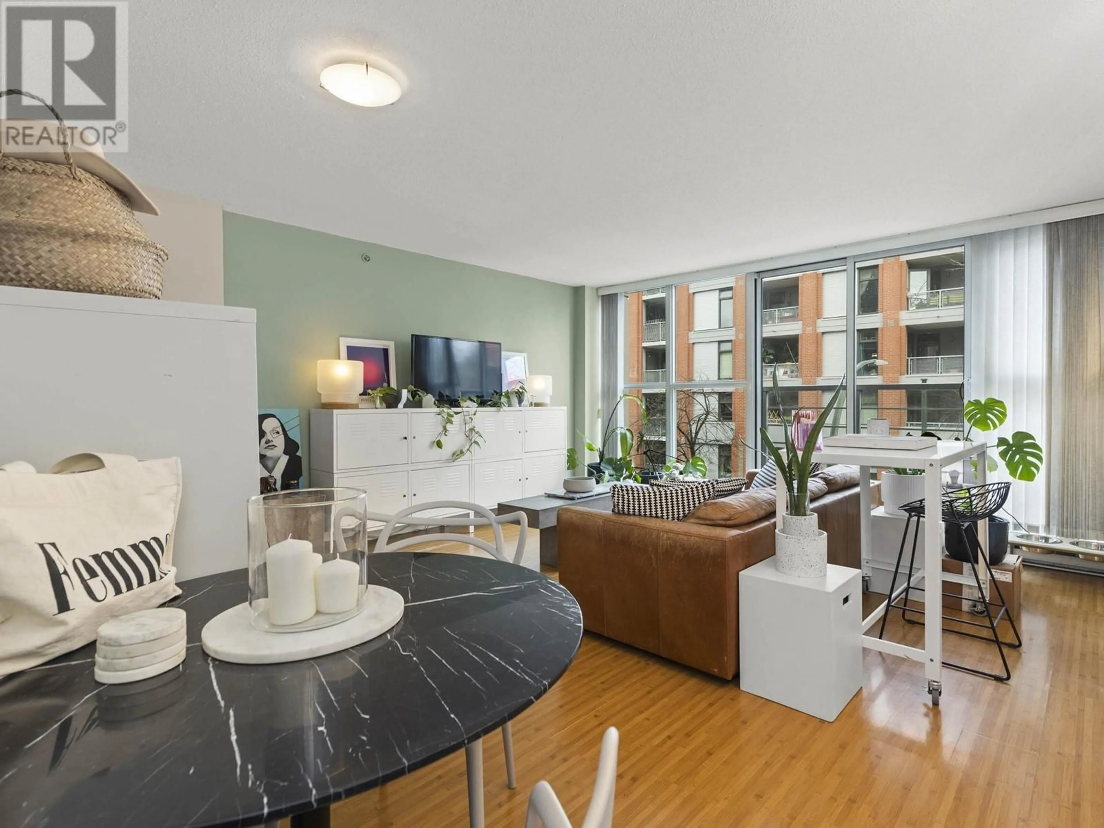 Living room with furniture, wood/laminate floor for 308 168 POWELL STREET, Vancouver British Columbia V6A0B2