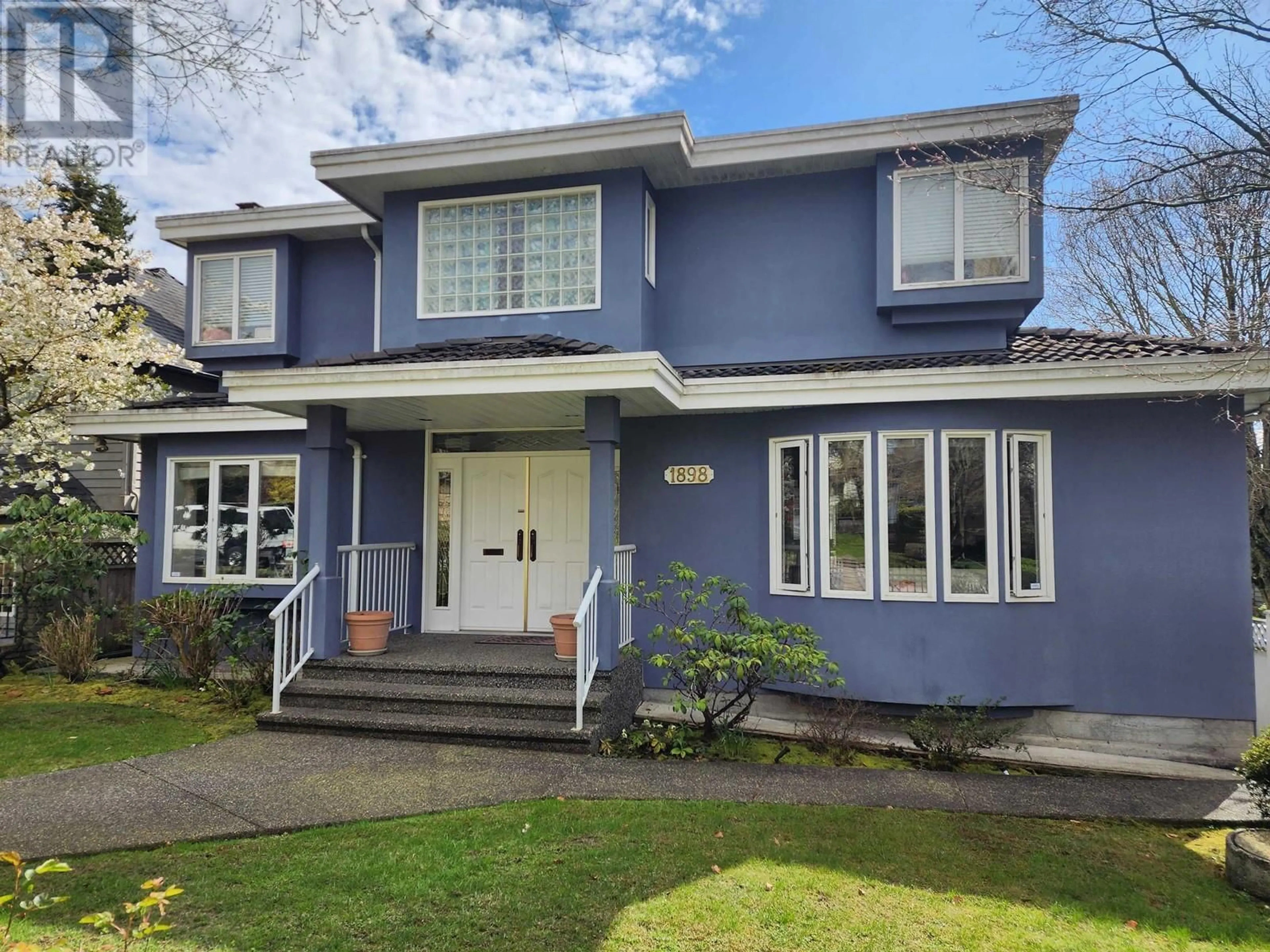 Home with vinyl exterior material, street for 1898 61ST AVENUE, Vancouver British Columbia V6P2C4