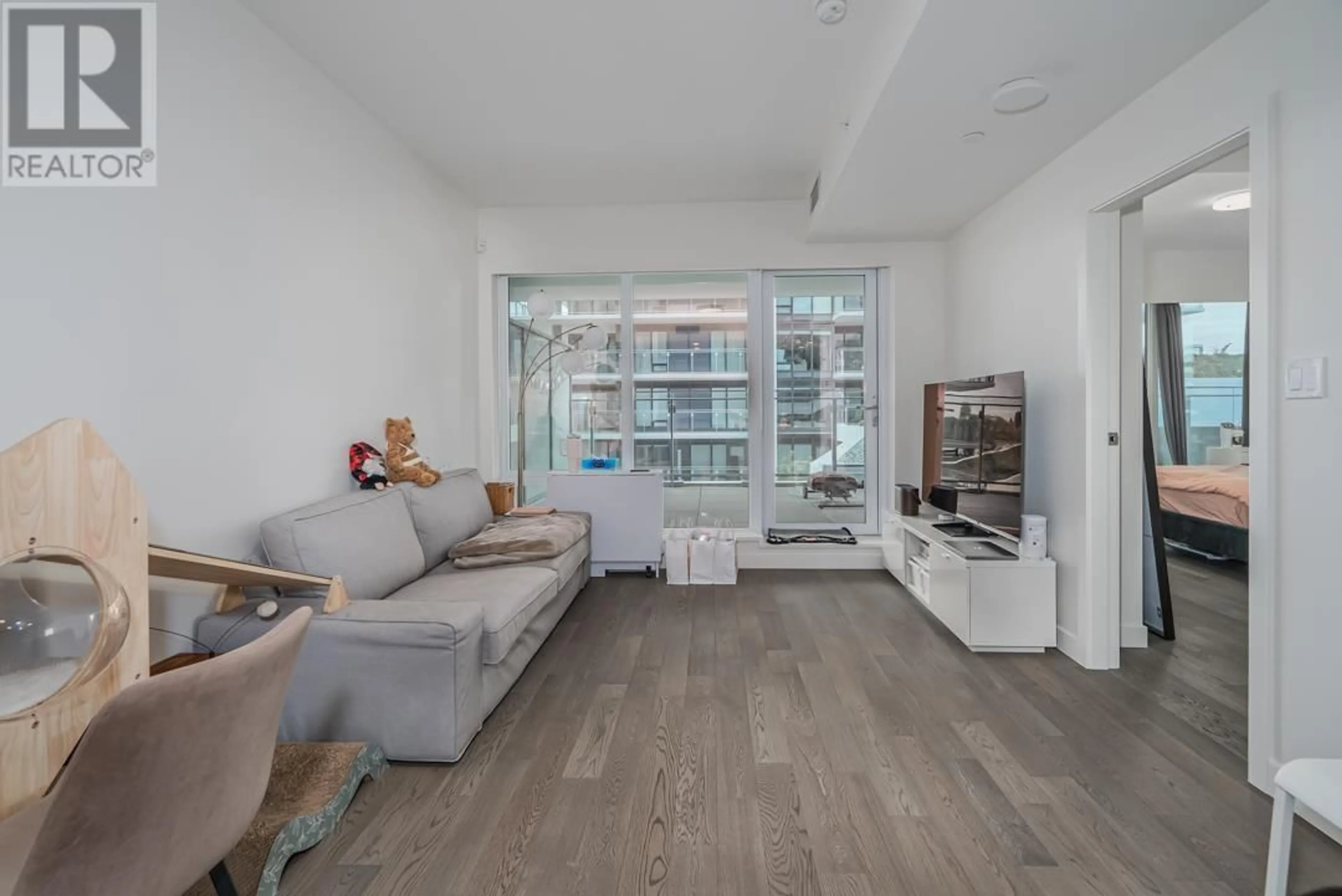 Living room with furniture, unknown for 306 - 6855 PEARSON WAY, Richmond British Columbia V7C0E9