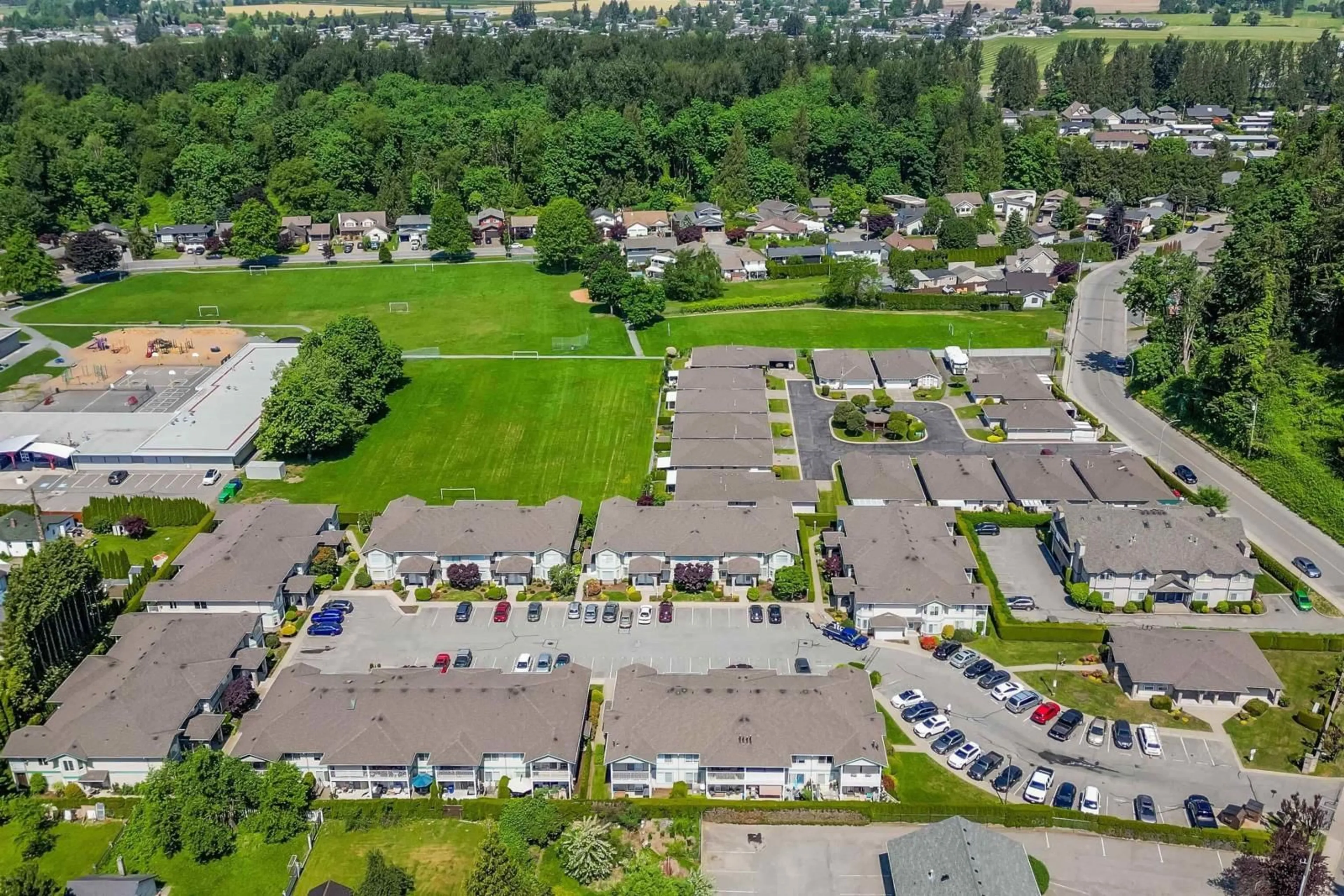 A pic from outside/outdoor area/front of a property/back of a property/a pic from drone, street for 129 9855 QUARRY ROAD|Chilliwack Proper E, Chilliwack British Columbia V2P3M3