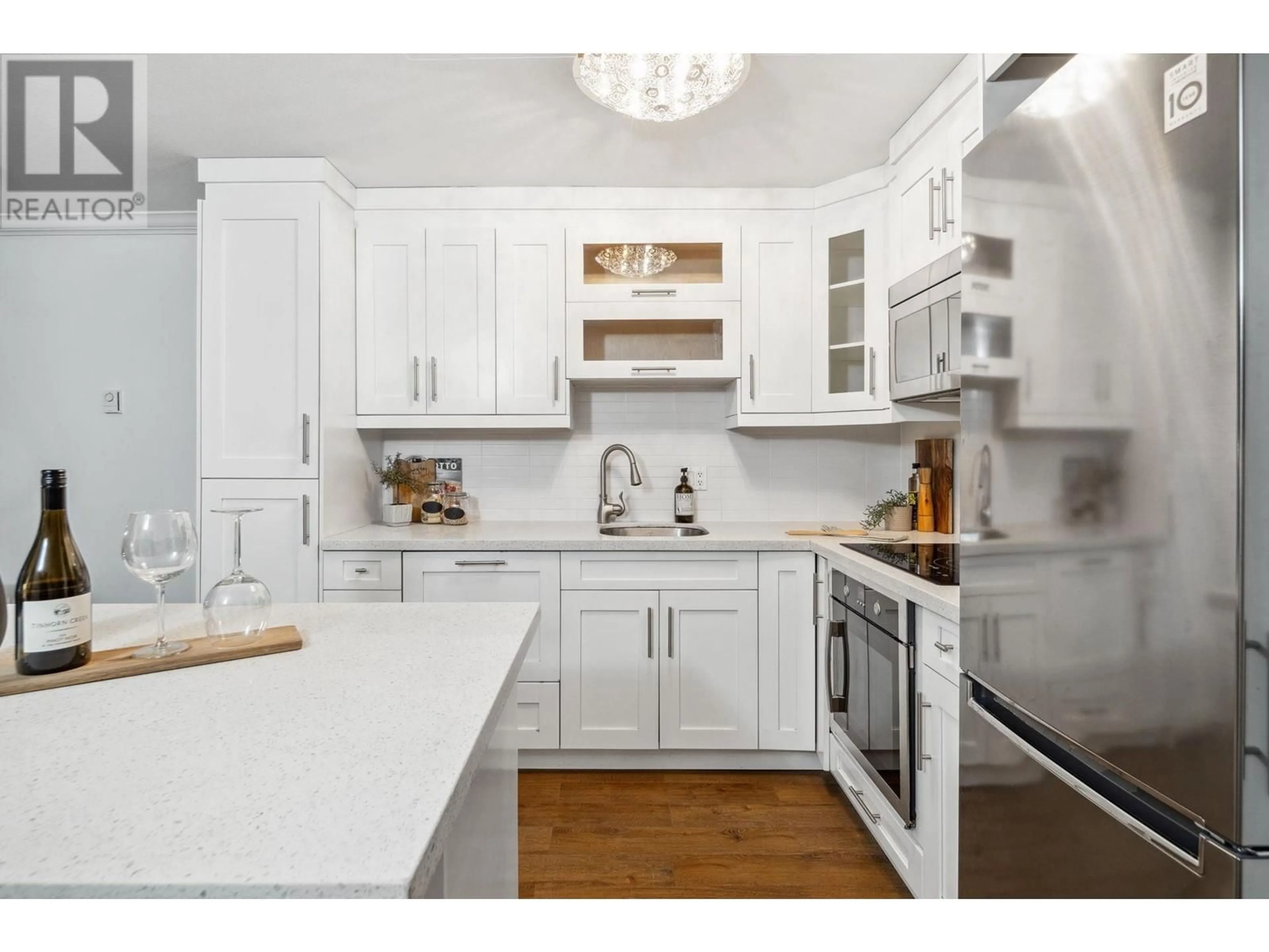 Open concept kitchen, unknown for 210 5629 DUNBAR STREET, Vancouver British Columbia V6N1W5