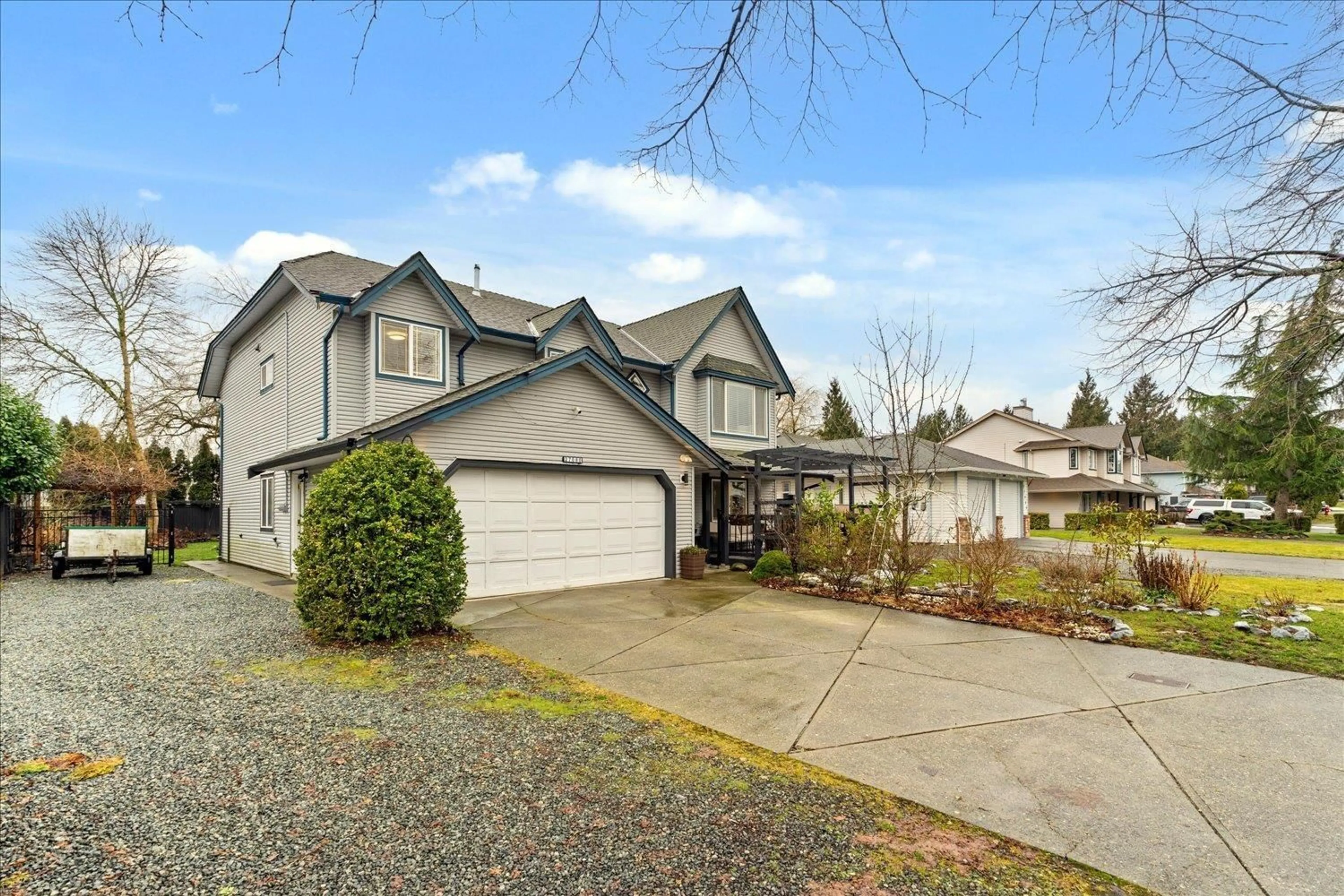 Home with vinyl exterior material, street for 27080 27, Langley British Columbia V4W3E7