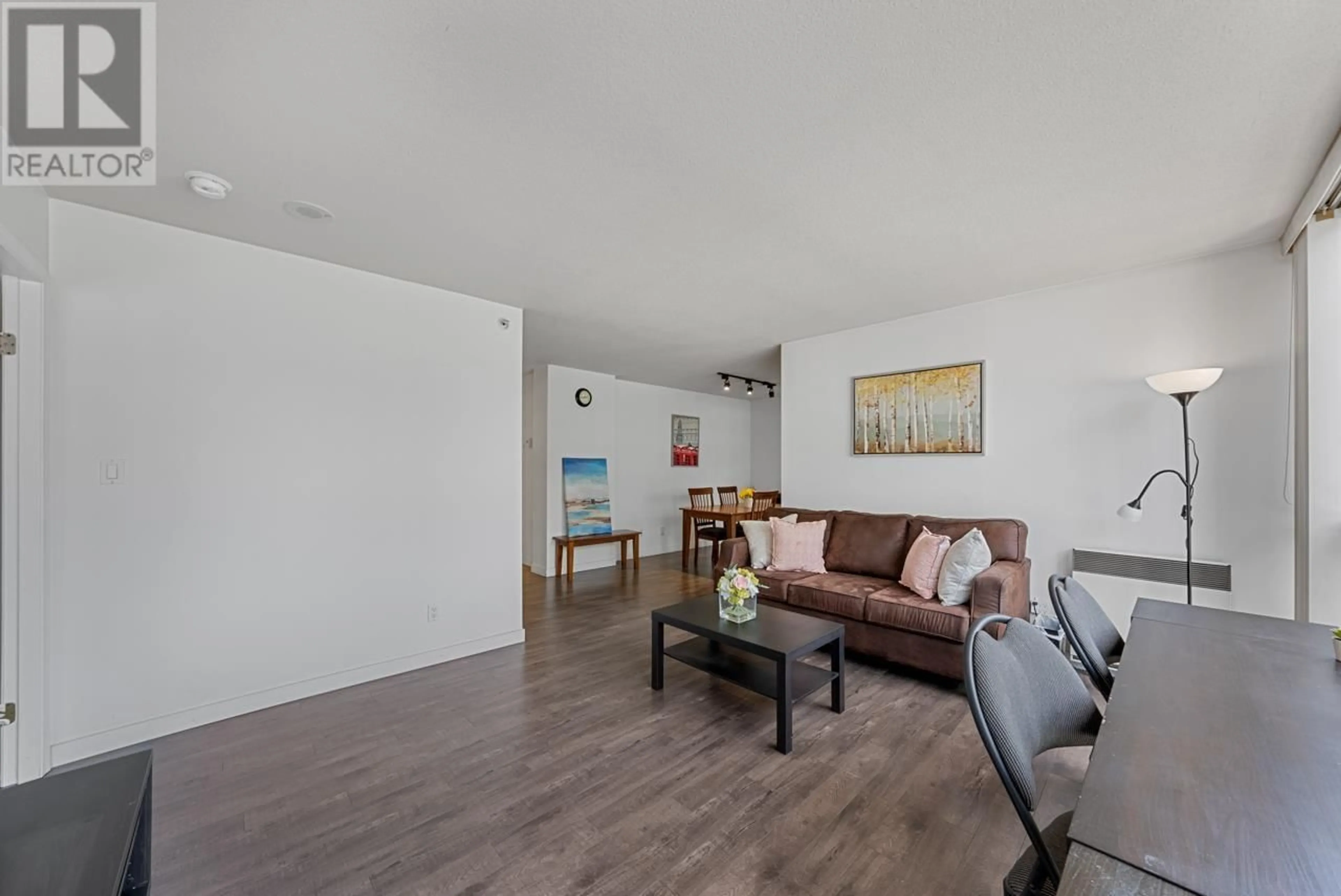 Living room with furniture, wood/laminate floor for 705 950 CAMBIE STREET, Vancouver British Columbia V6B5X5