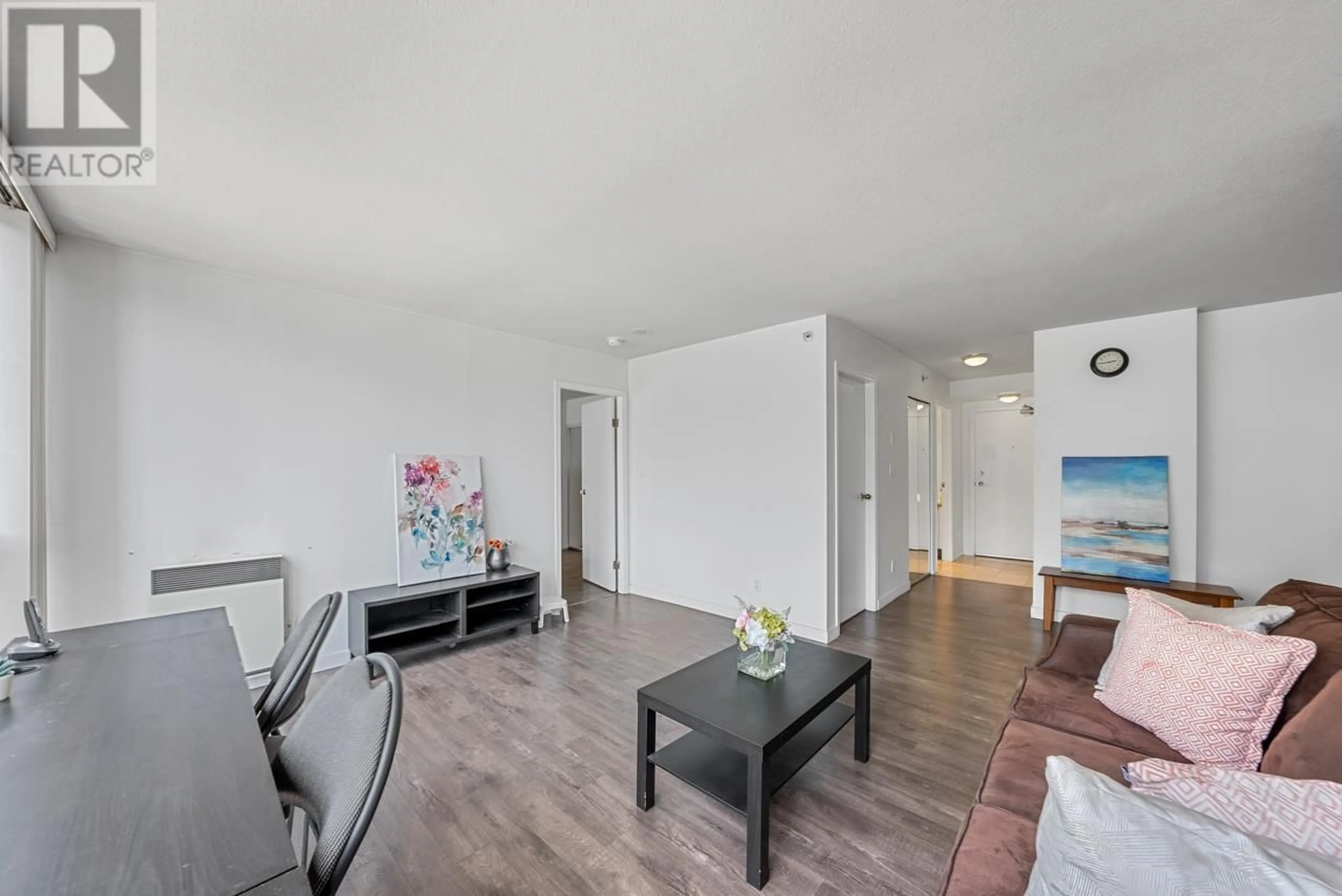 Living room with furniture, wood/laminate floor for 705 950 CAMBIE STREET, Vancouver British Columbia V6B5X5