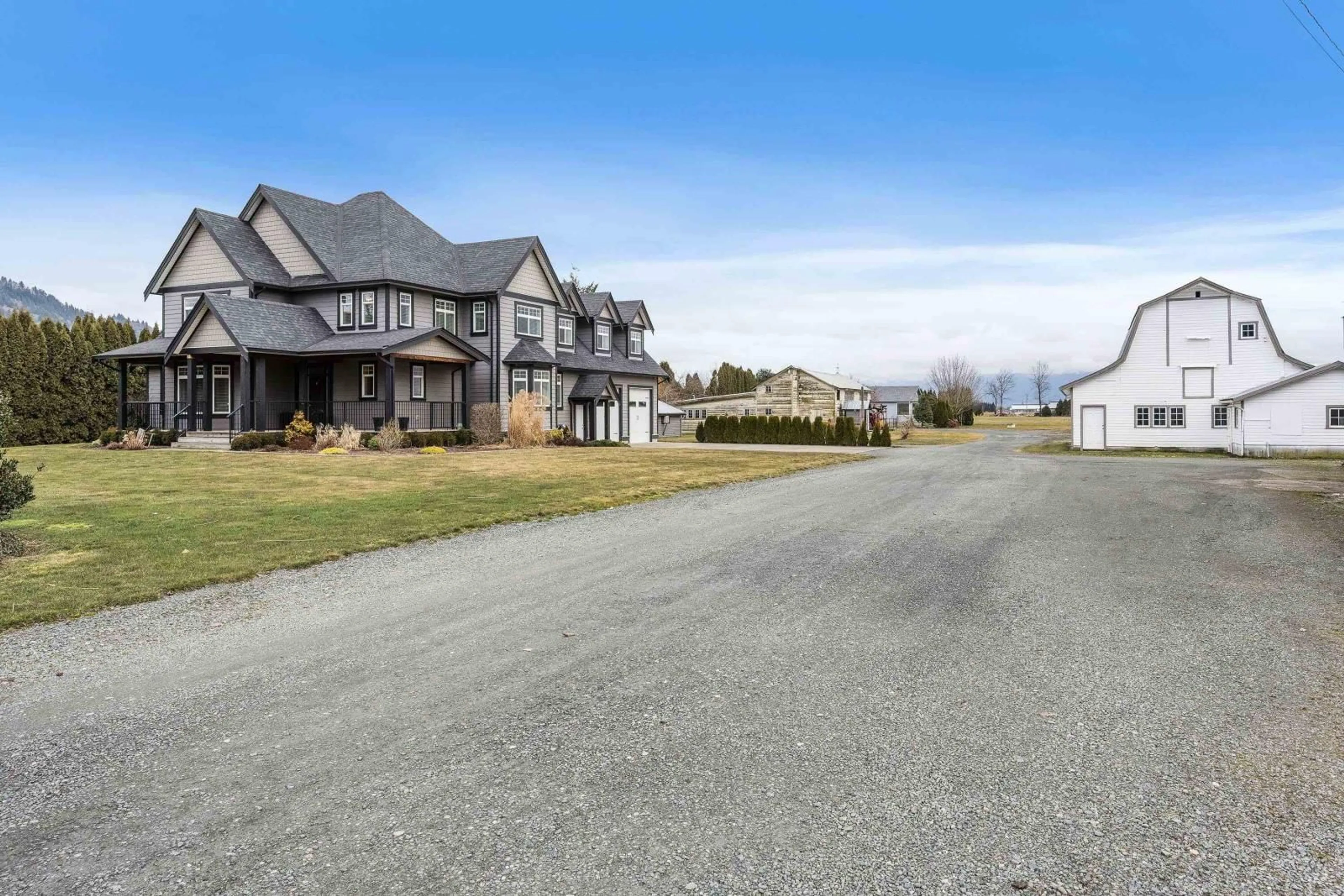 A pic from outside/outdoor area/front of a property/back of a property/a pic from drone, street for 6920 SUMAS PRAIRIE ROAD, Chilliwack British Columbia V2R4K1