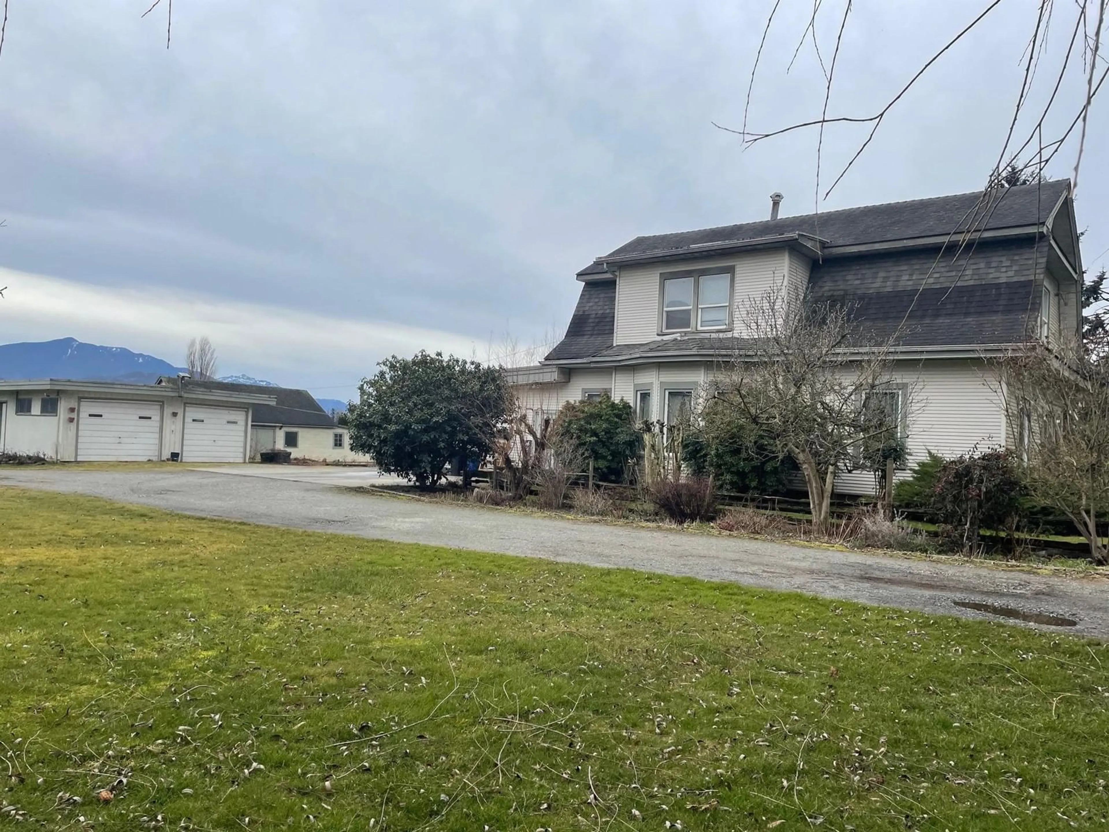 A pic from outside/outdoor area/front of a property/back of a property/a pic from drone, mountain view for 49090 YALE ROAD, Chilliwack British Columbia V4Z0B2