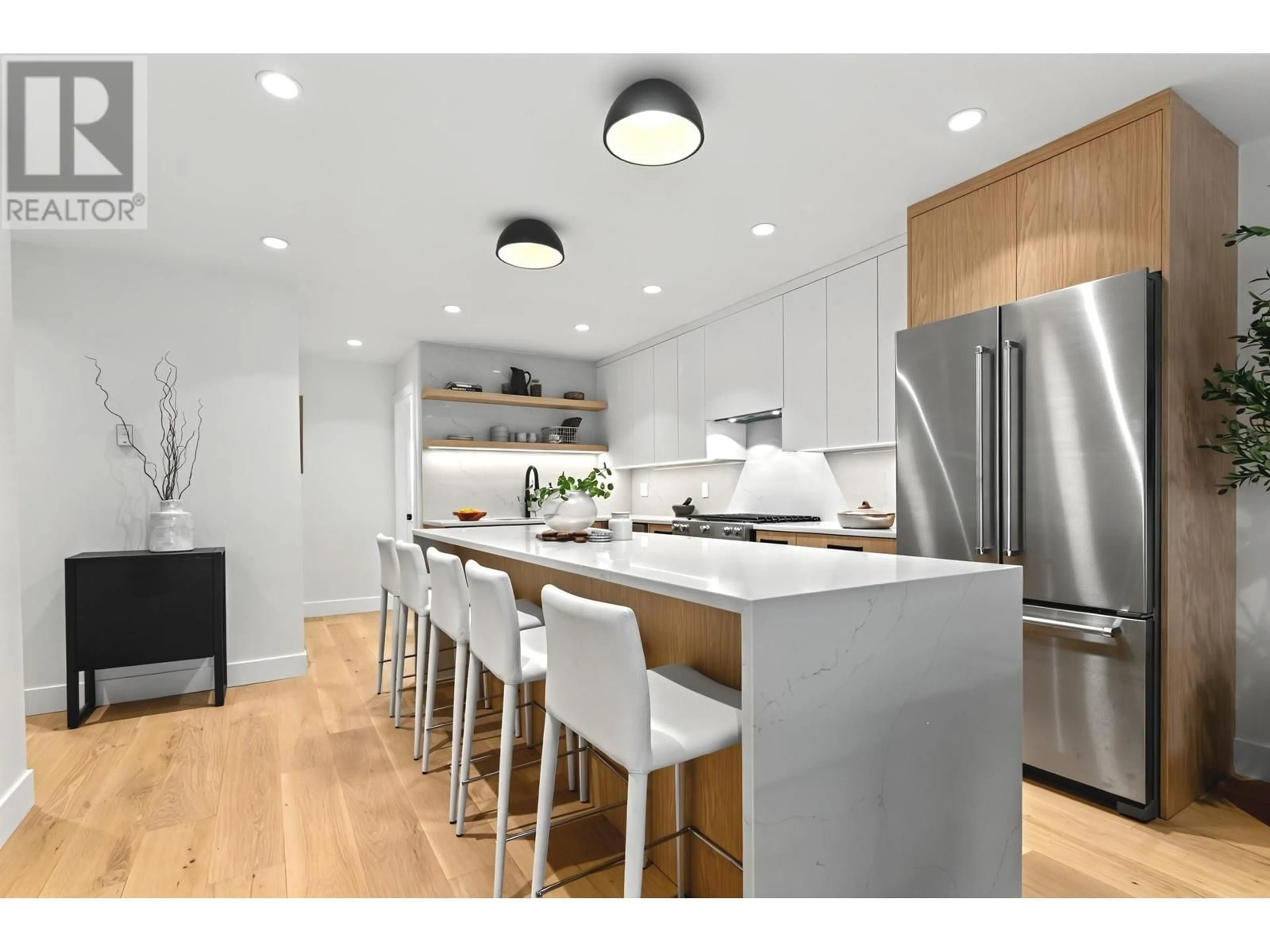 Contemporary kitchen, wood/laminate floor for 410 - 288 6TH STREET, North Vancouver British Columbia V7L1P5