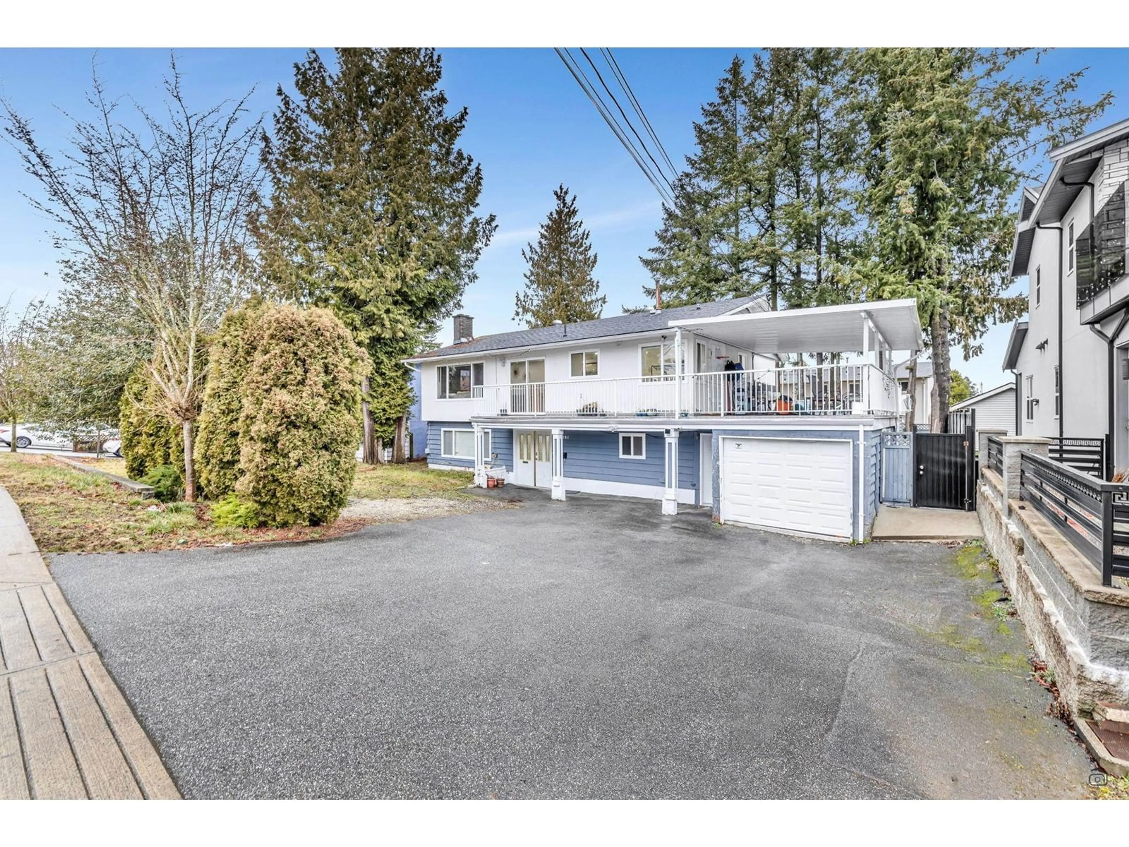 A pic from outside/outdoor area/front of a property/back of a property/a pic from drone, street for 11761 92 AVENUE, Delta British Columbia V4C3L3