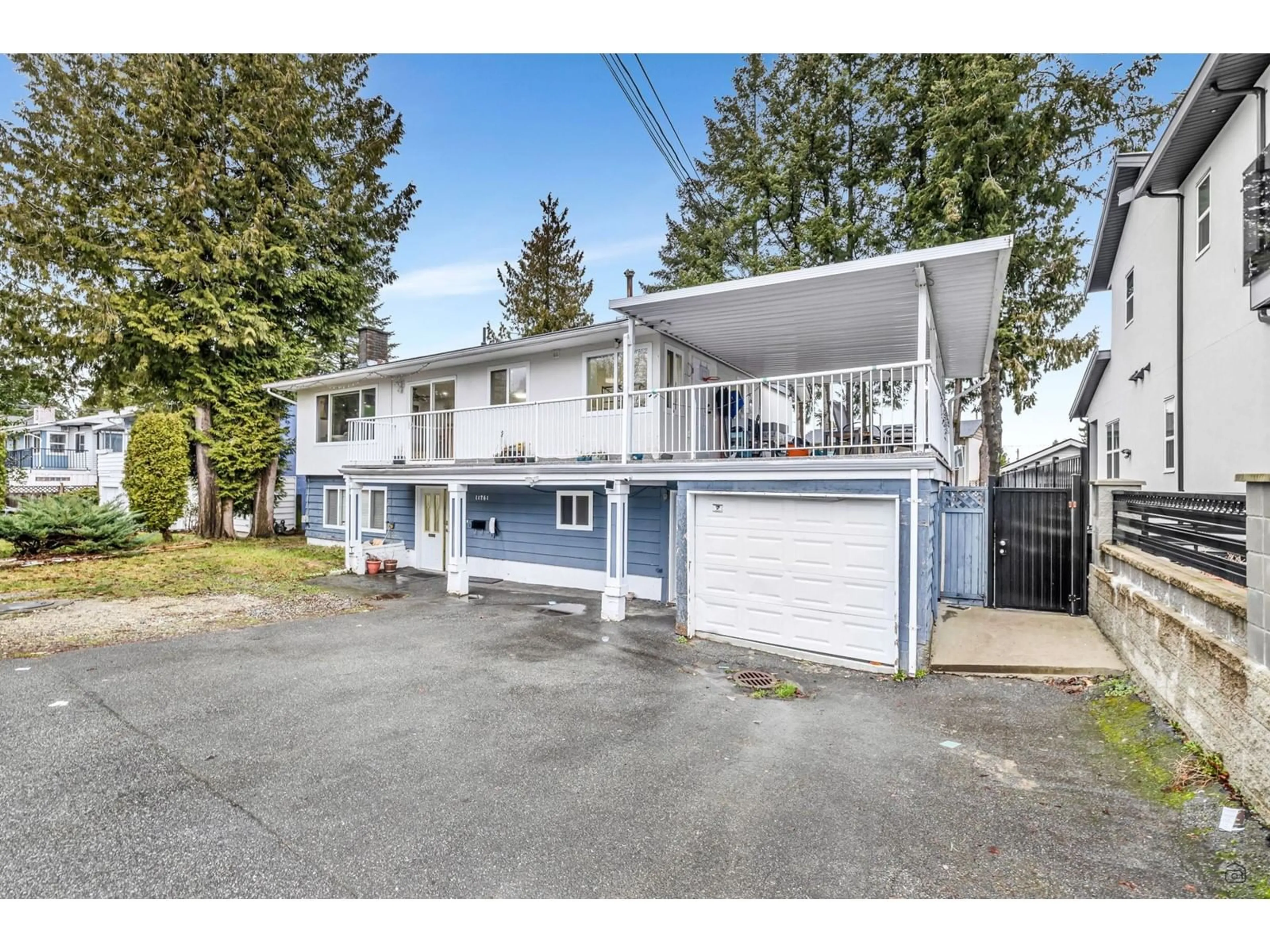 A pic from outside/outdoor area/front of a property/back of a property/a pic from drone, street for 11761 92 AVENUE, Delta British Columbia V4C3L3