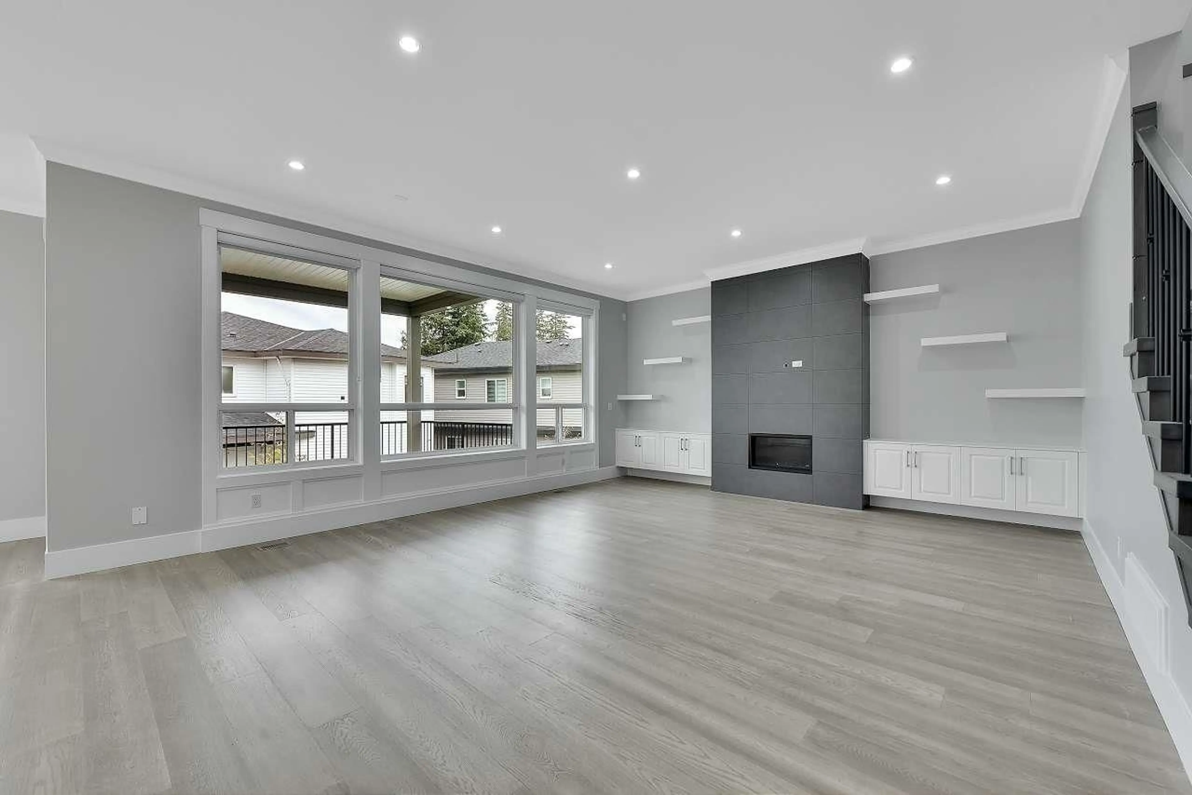 Living room with furniture, wood/laminate floor for 14293 61B, Surrey British Columbia V3X0K5