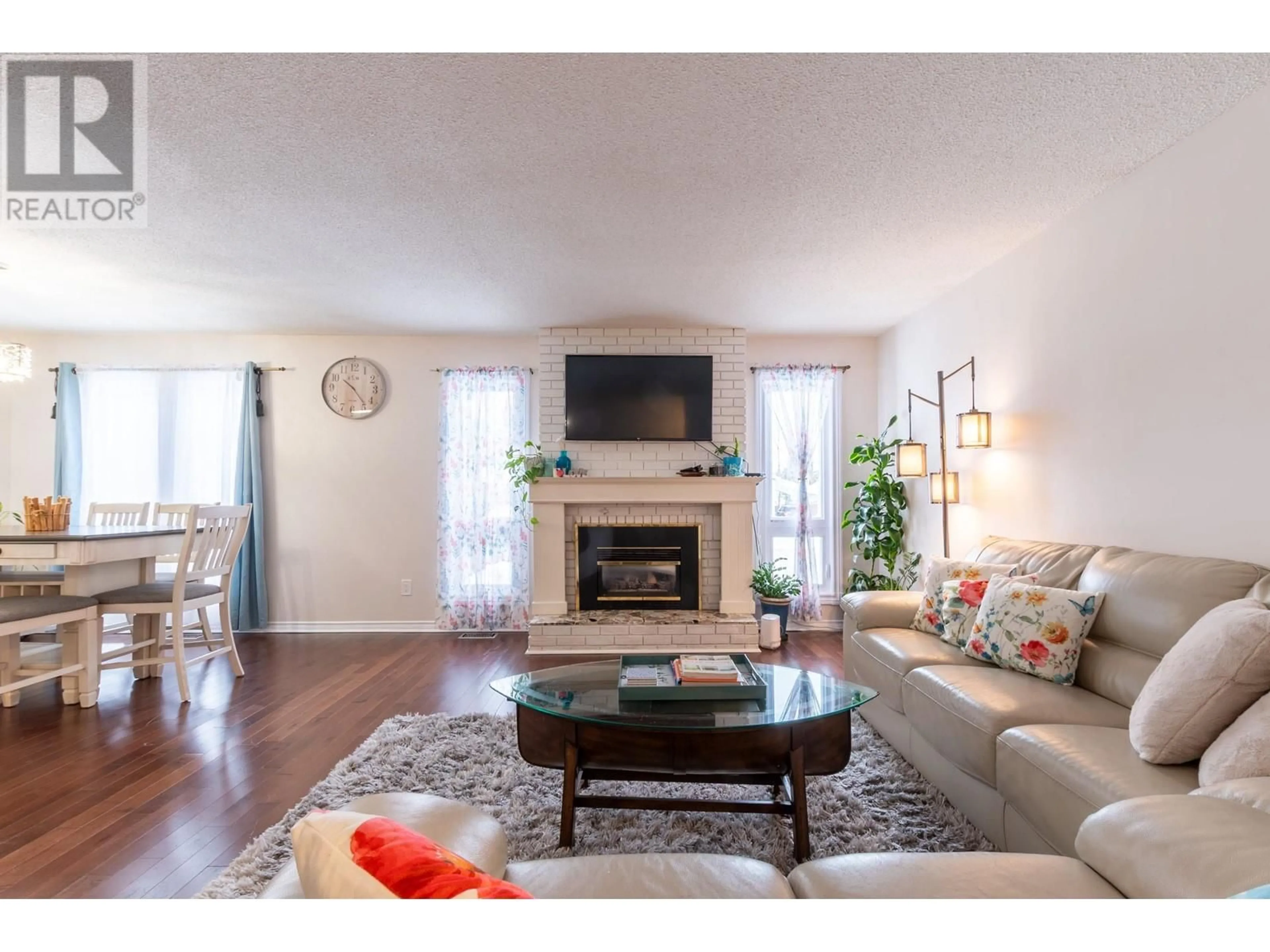 Living room with furniture, wood/laminate floor for 8125 ROCHESTER CRESCENT, Prince George British Columbia V2N3W9