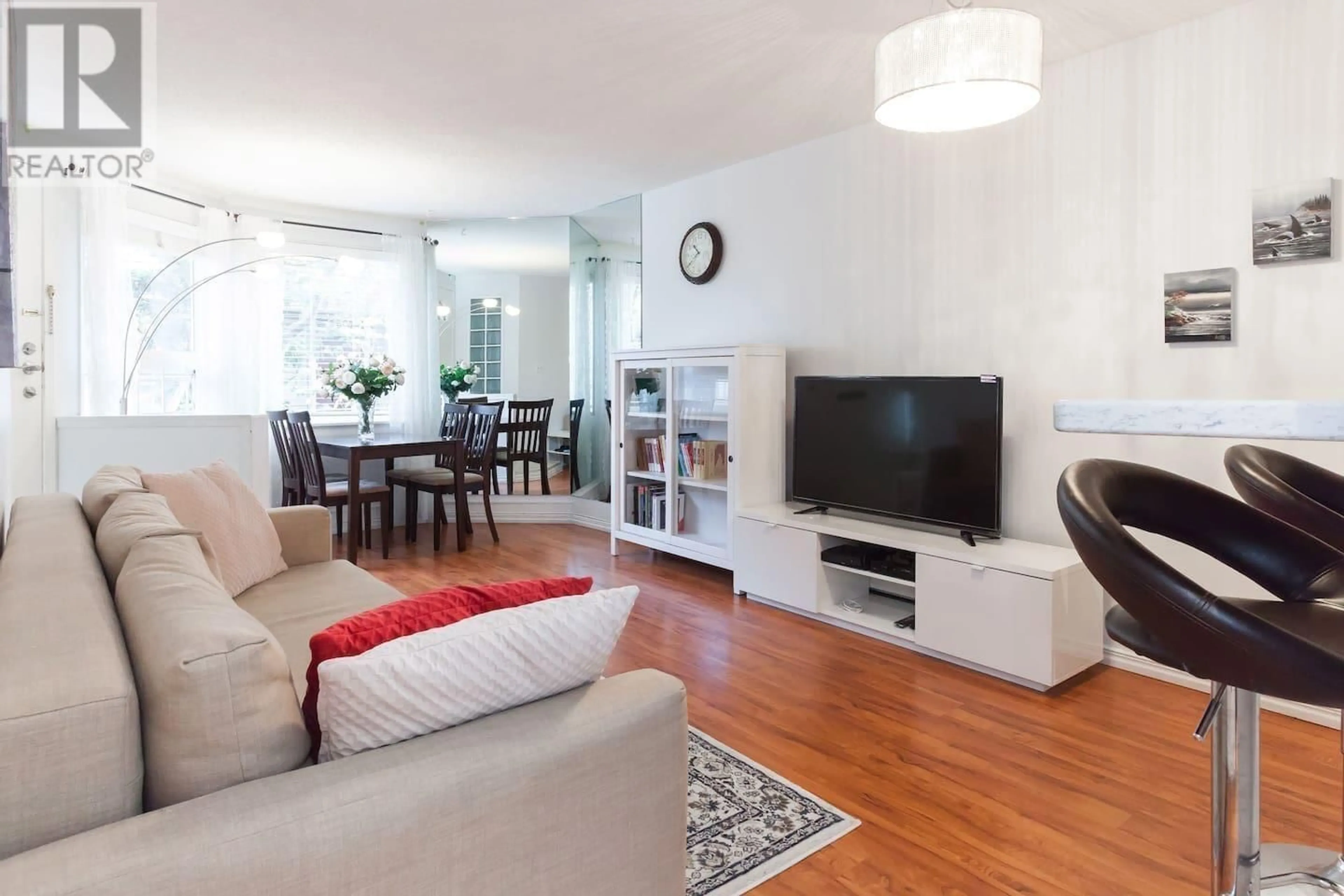 Living room with furniture, wood/laminate floor for 4 1101 W 8TH AVENUE, Vancouver British Columbia V6H1C5